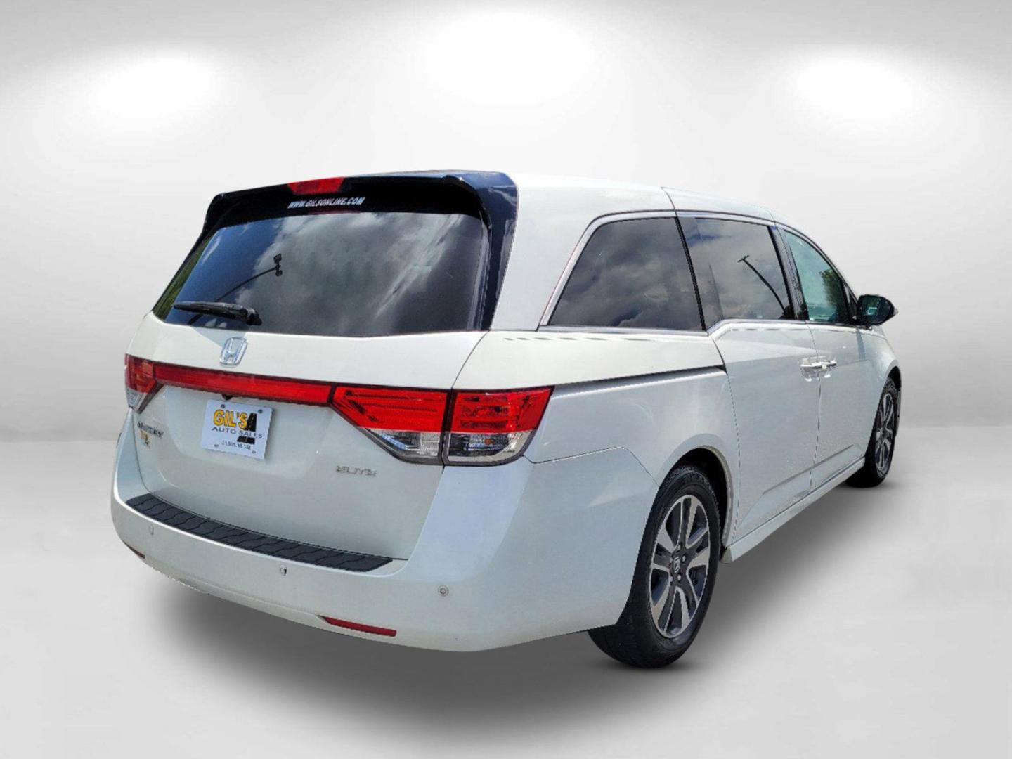 2016 White Honda Odyssey Touring Elite (5FNRL5H96GB) with an Regular Unleaded V-6 3.5 L/212 engine, 6-Speed Automatic w/OD transmission, located at 1430 Gateway Drive, Opelika, AL, 36801, (334) 239-0944, 32.637871, -85.409790 - 2016 Honda Odyssey Touring Elite - Photo#4