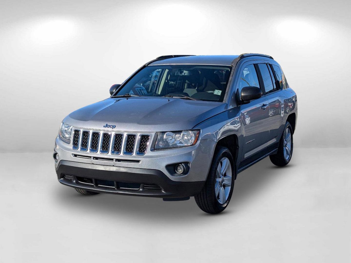 2016 /Dark Slate Gray Jeep Compass Sport (1C4NJDBB6GD) with an Regular Unleaded I-4 2.4 L/144 engine, 6-Speed Automatic w/OD transmission, located at 804 22nd Ave, Phenix City, AL, 36870, (334) 297-1860, 32.484749, -85.024475 - 2016 Jeep Compass Sport - Photo#1