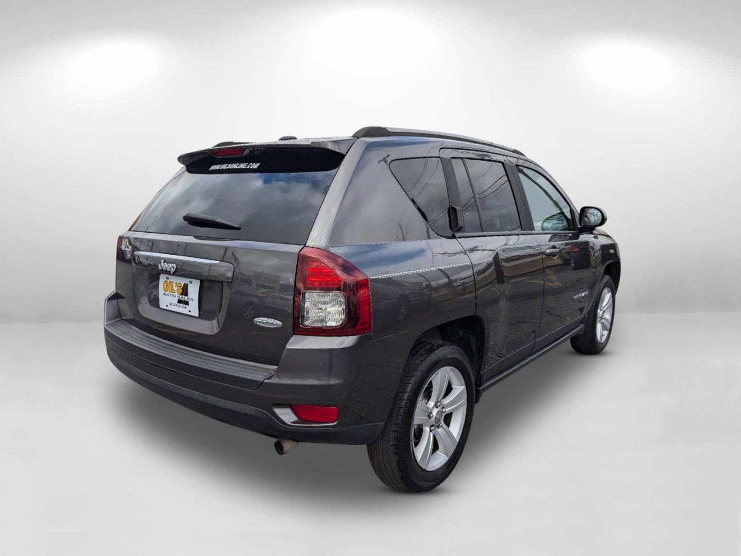 2016 /Dark Slate Gray Jeep Compass Latitude (1C4NJCEA9GD) with an Regular Unleaded I-4 2.0 L/122 engine, 1-Speed CVT w/OD transmission, located at 3959 U.S. 80 W, Phenix City, AL, 36870, (334) 297-4885, 32.469296, -85.135185 - 2016 Jeep Compass Latitude - Photo#6