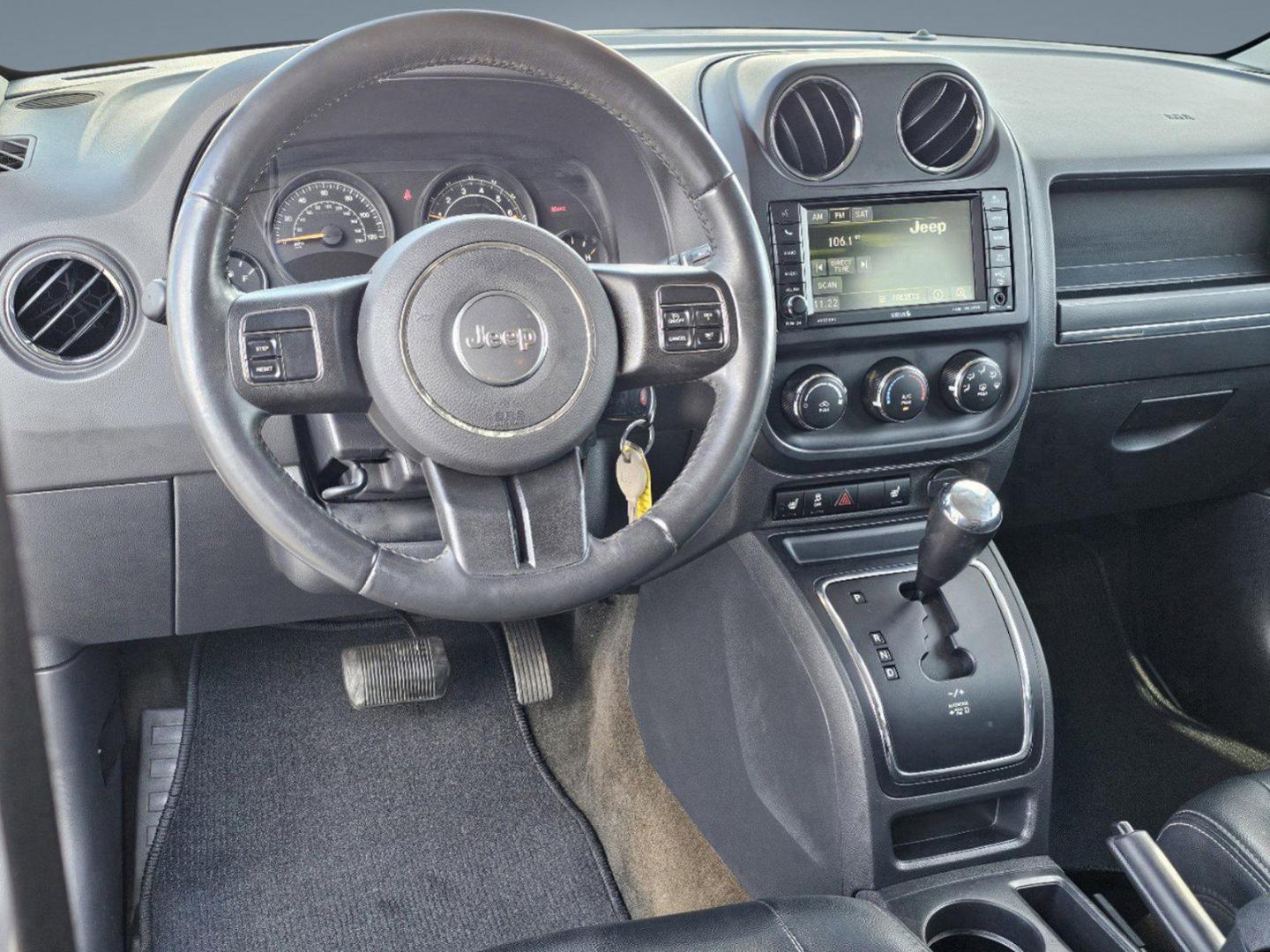 2016 Bright White Clearcoat /Dark Slate Gray Jeep Patriot High Altitude Edition (1C4NJPFA9GD) with an Regular Unleaded I-4 2.0 L/122 engine, 1-Speed CVT w/OD transmission, located at 5115 14th Ave., Columbus, GA, 31904, (706) 323-0345, 32.511494, -84.971046 - 2016 Jeep Patriot High Altitude Edition - Photo#12