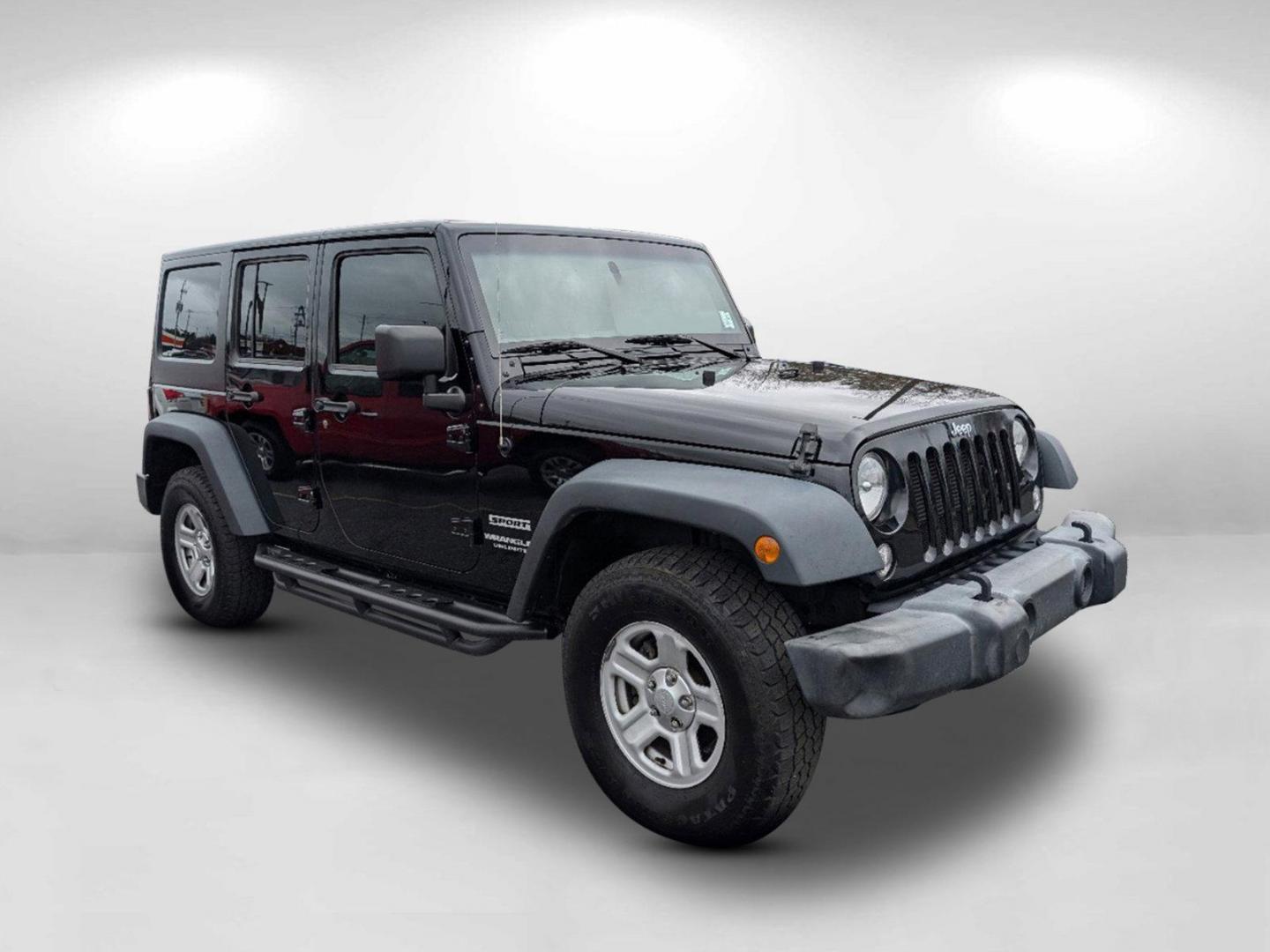 2016 /Black Jeep Wrangler Unlimited Sport (1C4BJWDG7GL) with an Regular Unleaded V-6 3.6 L/220 engine, 5-Speed Automatic w/OD transmission, located at 1430 Gateway Drive, Opelika, AL, 36801, (334) 239-0944, 32.637871, -85.409790 - 2016 Jeep Wrangler Unlimited Sport - Photo#2