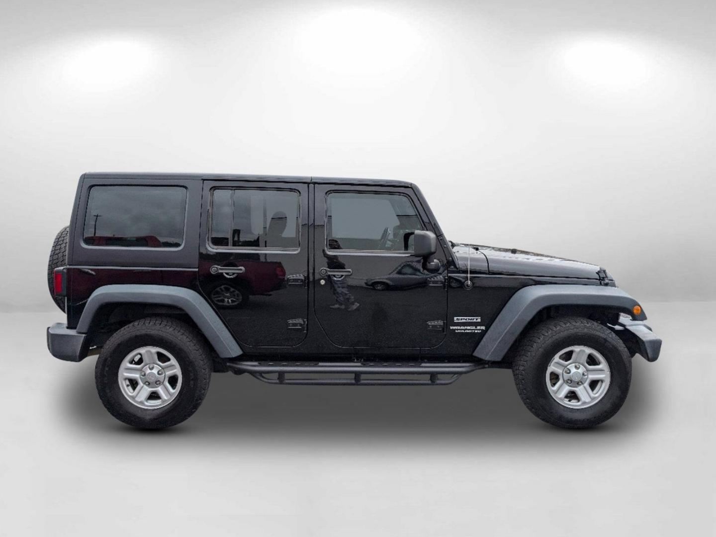 2016 /Black Jeep Wrangler Unlimited Sport (1C4BJWDG7GL) with an Regular Unleaded V-6 3.6 L/220 engine, 5-Speed Automatic w/OD transmission, located at 1430 Gateway Drive, Opelika, AL, 36801, (334) 239-0944, 32.637871, -85.409790 - 2016 Jeep Wrangler Unlimited Sport - Photo#3