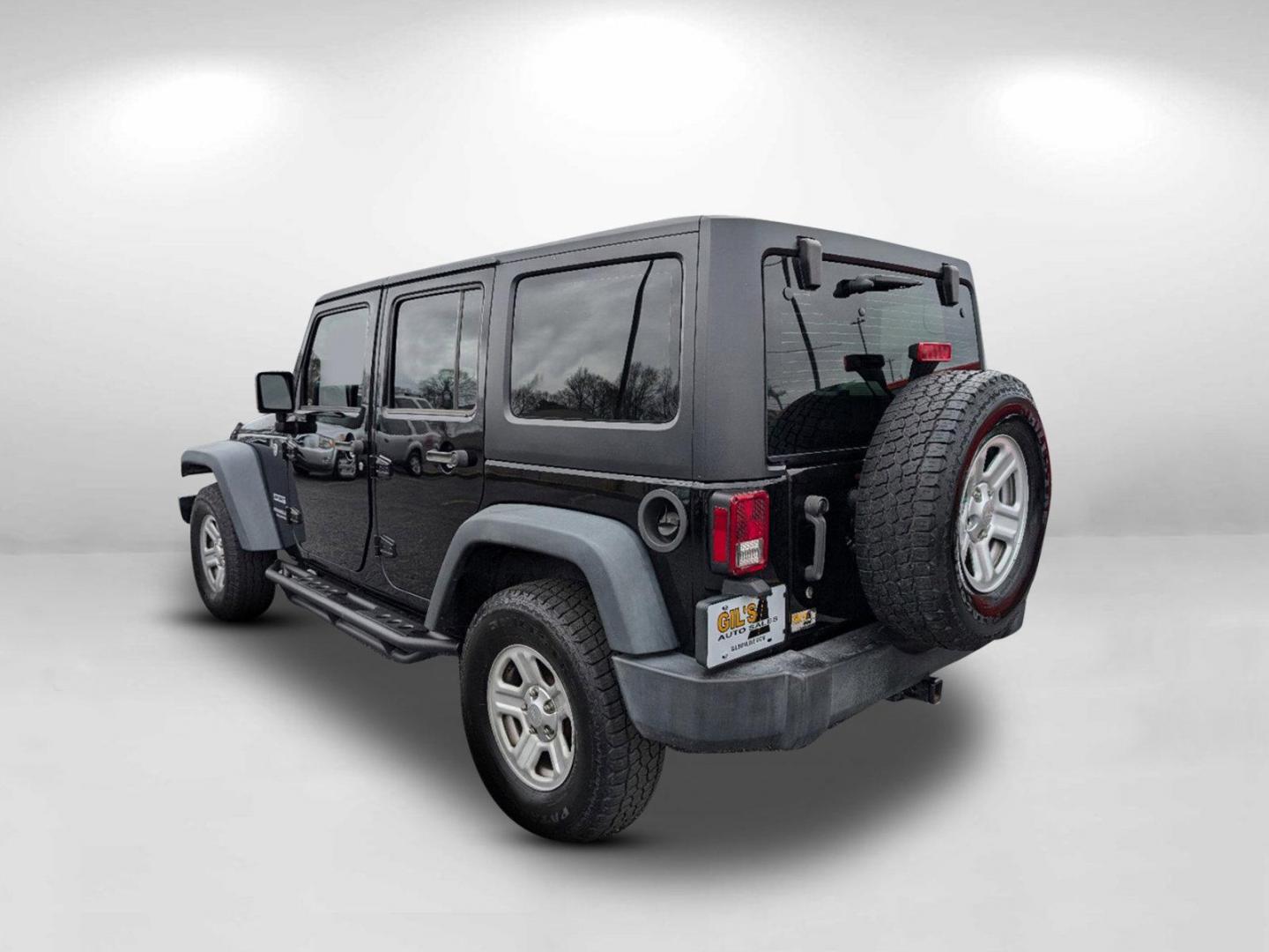 2016 /Black Jeep Wrangler Unlimited Sport (1C4BJWDG7GL) with an Regular Unleaded V-6 3.6 L/220 engine, 5-Speed Automatic w/OD transmission, located at 1430 Gateway Drive, Opelika, AL, 36801, (334) 239-0944, 32.637871, -85.409790 - 2016 Jeep Wrangler Unlimited Sport - Photo#6