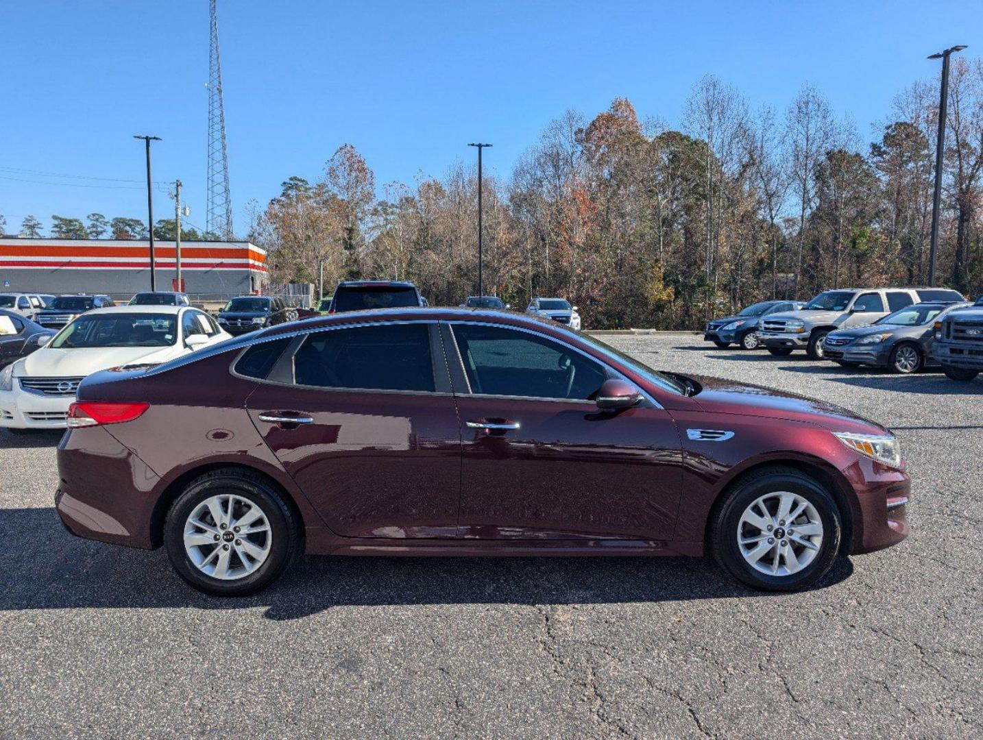 2016 /Black Kia Optima LX (5XXGT4L33GG) with an Regular Unleaded I-4 2.4 L/144 engine, 6-Speed Automatic w/OD transmission, located at 3959 U.S. 80 W, Phenix City, AL, 36870, (334) 297-4885, 32.469296, -85.135185 - 2016 Kia Optima LX - Photo#3