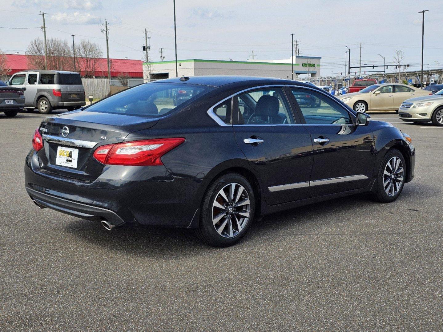 2016 /Charcoal Nissan Altima 2.5 SL (1N4AL3AP1GC) with an Regular Unleaded I-4 2.5 L/152 engine, 1-Speed CVT w/OD transmission, located at 521 Old Farm Lane Rd, Prattville, AL, 36066, (334) 325-1505, 32.482460, -86.416367 - 2016 Nissan Altima 2.5 SL - Photo#4