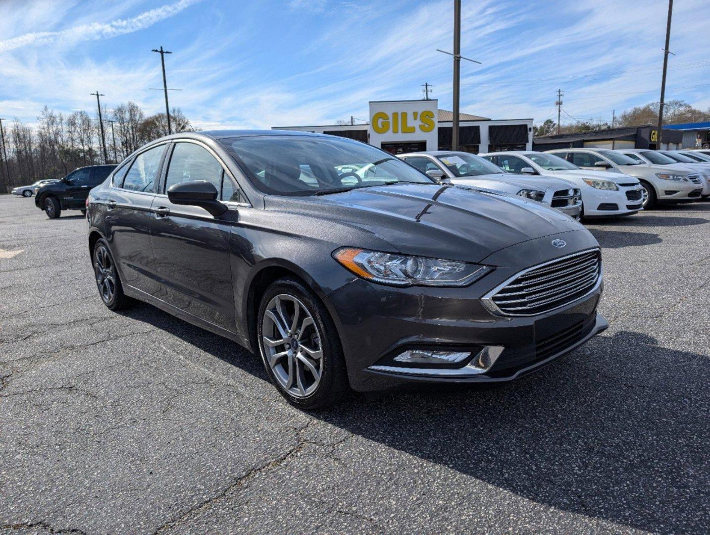 2017 Ford Fusion SE (3FA6P0H77HR) with an Regular Unleaded I-4 2.5 L/152 engine, 6-Speed Automatic w/OD transmission, located at 3959 U.S. 80 W, Phenix City, AL, 36870, (334) 297-4885, 32.469296, -85.135185 - 2017 Ford Fusion SE - Photo#3