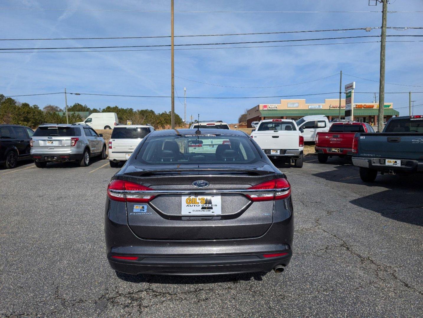 2017 Ford Fusion SE (3FA6P0H77HR) with an Regular Unleaded I-4 2.5 L/152 engine, 6-Speed Automatic w/OD transmission, located at 3959 U.S. 80 W, Phenix City, AL, 36870, (334) 297-4885, 32.469296, -85.135185 - 2017 Ford Fusion SE - Photo#6