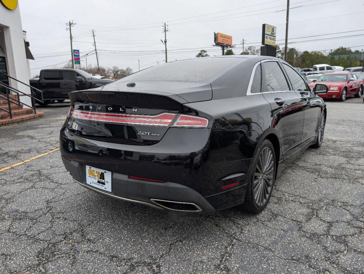 2017 Lincoln MKZ Reserve (3LN6L5F90HR) with an Intercooled Turbo Premium Unleaded I-4 2.0 L/122 engine, 6-Speed Automatic w/OD transmission, located at 3959 U.S. 80 W, Phenix City, AL, 36870, (334) 297-4885, 32.469296, -85.135185 - 2017 Lincoln MKZ Reserve - Photo#4