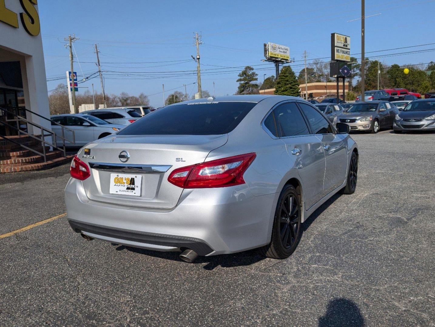 2017 /Charcoal Nissan Altima 2.5 SL (1N4AL3AP4HC) with an Regular Unleaded I-4 2.5 L/152 engine, 1-Speed CVT w/OD transmission, located at 7000 Northlake Connector, Columbus, GA, 31904, (706) 987-8085, 32.524975, -84.978134 - 2017 Nissan Altima 2.5 SL - Photo#4