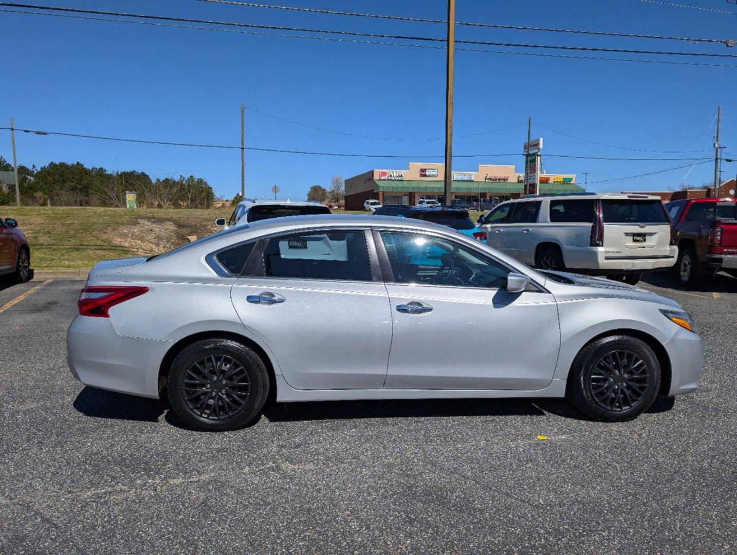 2017 /Charcoal Nissan Altima 2.5 S (1N4AL3AP7HN) with an Regular Unleaded I-4 2.5 L/152 engine, 1-Speed CVT w/OD transmission, located at 3959 U.S. 80 W, Phenix City, AL, 36870, (334) 297-4885, 32.469296, -85.135185 - 2017 Nissan Altima 2.5 S - Photo#3