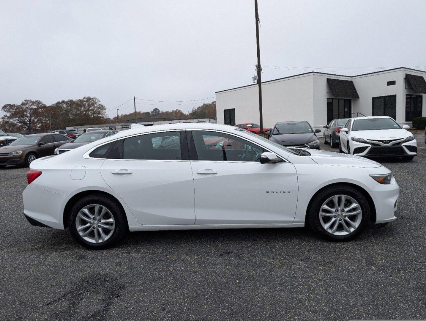 2018 /Jet Black Chevrolet Malibu LT (1G1ZD5ST7JF) with an Turbocharged Gas I4 1.5L/91 engine, 6-Speed Automatic transmission, located at 804 22nd Ave, Phenix City, AL, 36870, (334) 297-1860, 32.484749, -85.024475 - 2018 Chevrolet Malibu LT - Photo#3