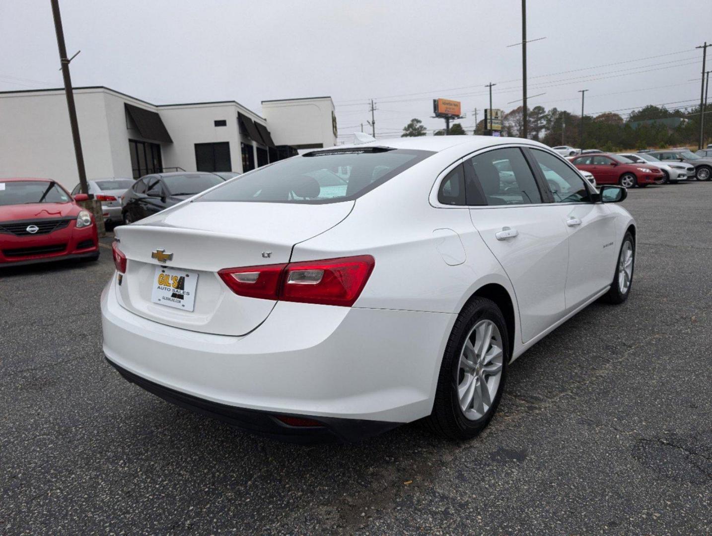 2018 /Jet Black Chevrolet Malibu LT (1G1ZD5ST7JF) with an Turbocharged Gas I4 1.5L/91 engine, 6-Speed Automatic transmission, located at 804 22nd Ave, Phenix City, AL, 36870, (334) 297-1860, 32.484749, -85.024475 - 2018 Chevrolet Malibu LT - Photo#4