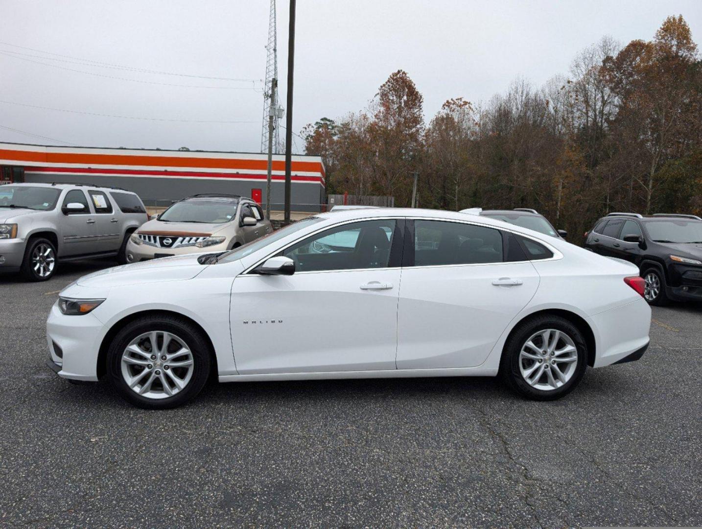 2018 /Jet Black Chevrolet Malibu LT (1G1ZD5ST7JF) with an Turbocharged Gas I4 1.5L/91 engine, 6-Speed Automatic transmission, located at 804 22nd Ave, Phenix City, AL, 36870, (334) 297-1860, 32.484749, -85.024475 - 2018 Chevrolet Malibu LT - Photo#7