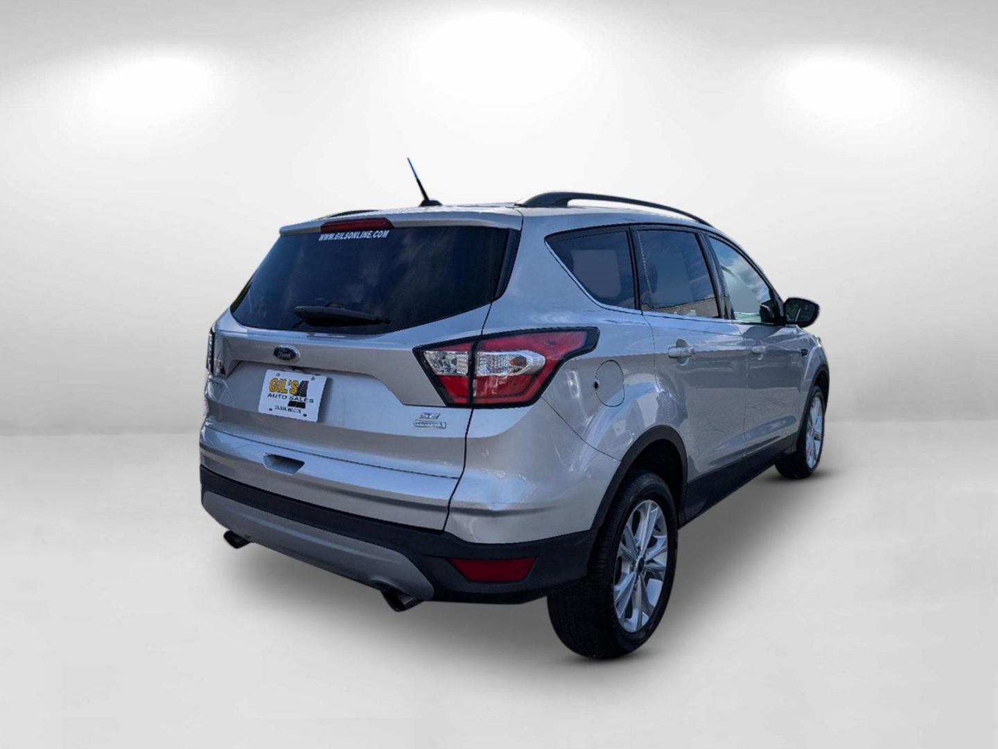 2018 Ford Escape SE (1FMCU0GD7JU) with an Intercooled Turbo Regular Unleaded I-4 1.5 L/91 engine, 6-Speed Automatic w/OD transmission, located at 7000 Northlake Connector, Columbus, GA, 31904, (706) 987-8085, 32.524975, -84.978134 - 2018 Ford Escape SE - Photo#4