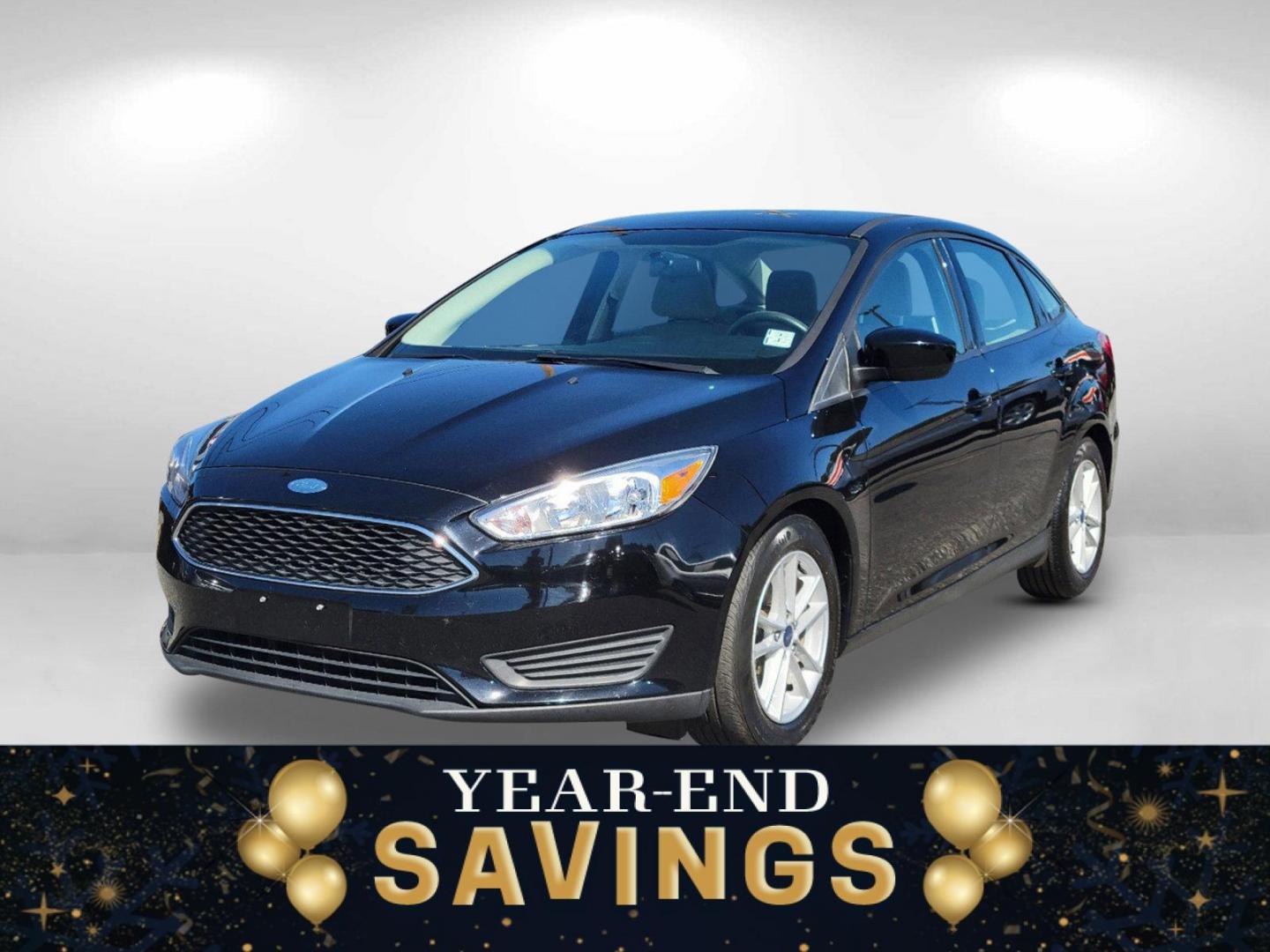 2018 Black Ford Focus SE (1FADP3FEXJL) with an Intercooled Turbo Regular Unleaded I-3 1.0 L/61 engine, located at 1430 Gateway Drive, Opelika, AL, 36801, (334) 239-0944, 32.637871, -85.409790 - 2018 Ford Focus SE - Photo#0