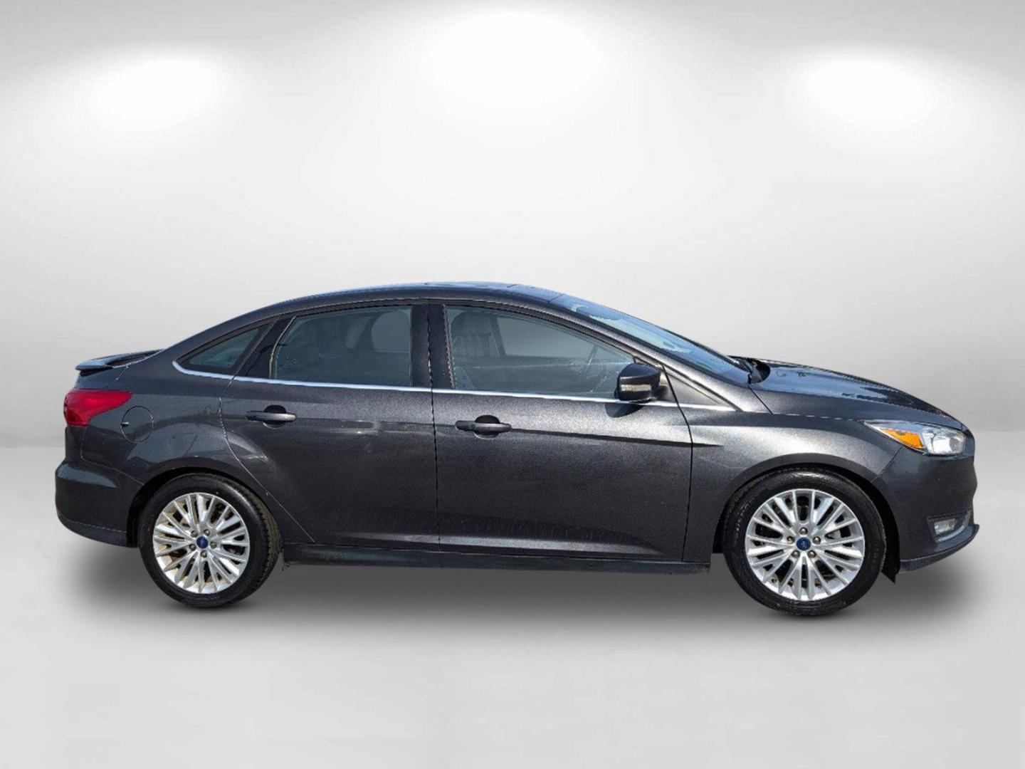 2018 Ford Focus Titanium (1FADP3J28JL) with an Regular Unleaded I-4 2.0 L/122 engine, 6-Speed Auto-Shift Manual w/OD transmission, located at 3959 U.S. 80 W, Phenix City, AL, 36870, (334) 297-4885, 32.469296, -85.135185 - 2018 Ford Focus Titanium - Photo#4