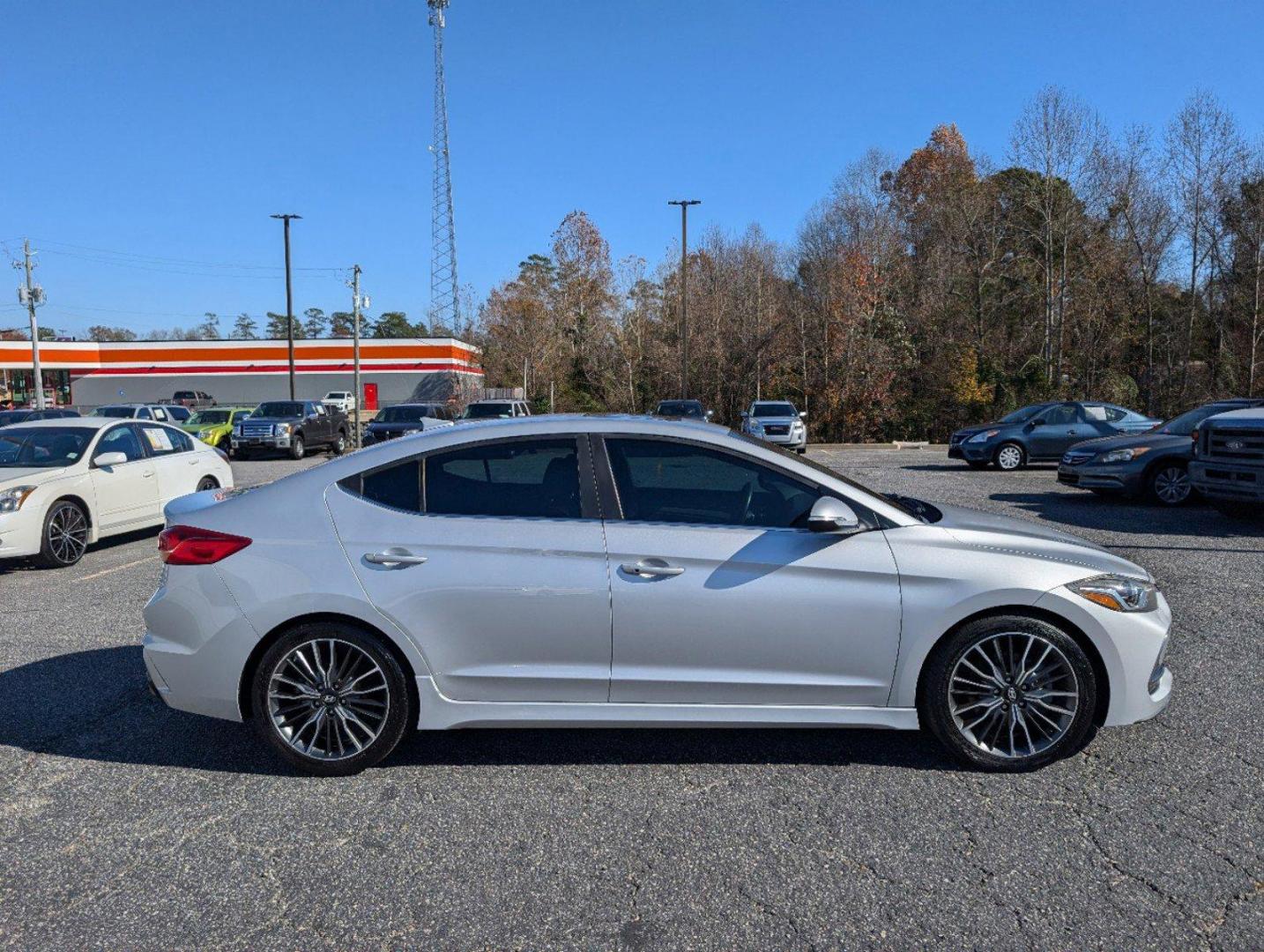 2018 /Black Hyundai Elantra Sport (KMHD04LB6JU) with an Intercooled Turbo Regular Unleaded I-4 1.6 L/97 engine, 7-Speed Auto-Shift Manual w/OD transmission, located at 3959 U.S. 80 W, Phenix City, AL, 36870, (334) 297-4885, 32.469296, -85.135185 - 2018 Hyundai Elantra Sport - Photo#3