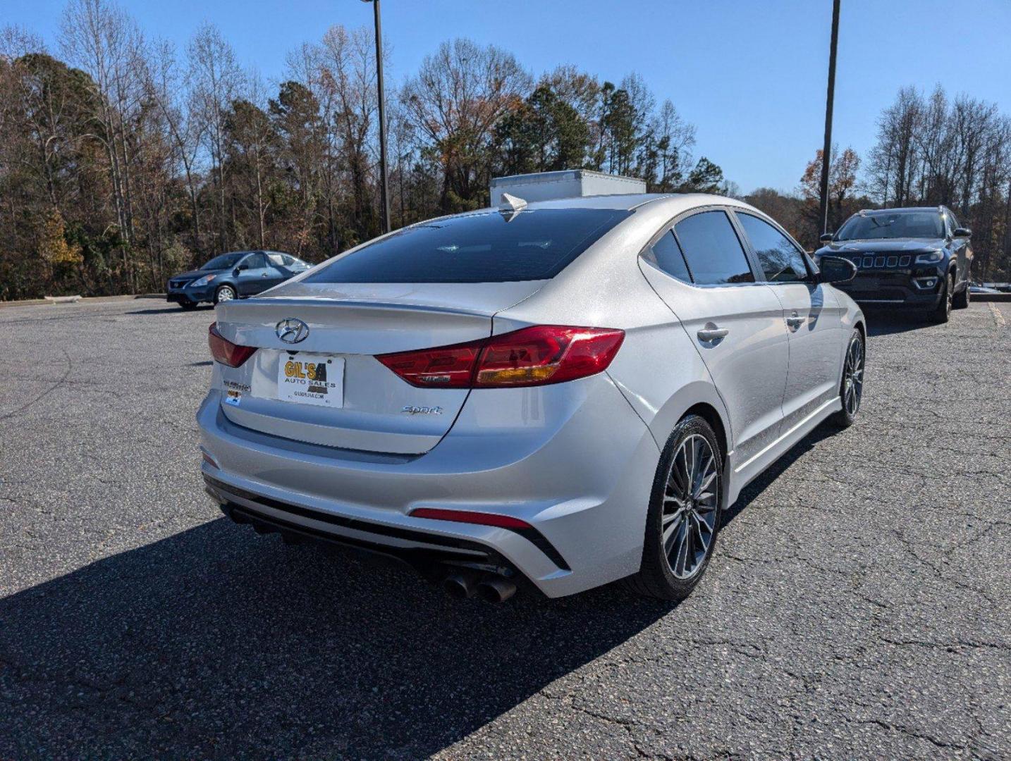 2018 /Black Hyundai Elantra Sport (KMHD04LB6JU) with an Intercooled Turbo Regular Unleaded I-4 1.6 L/97 engine, 7-Speed Auto-Shift Manual w/OD transmission, located at 3959 U.S. 80 W, Phenix City, AL, 36870, (334) 297-4885, 32.469296, -85.135185 - 2018 Hyundai Elantra Sport - Photo#4