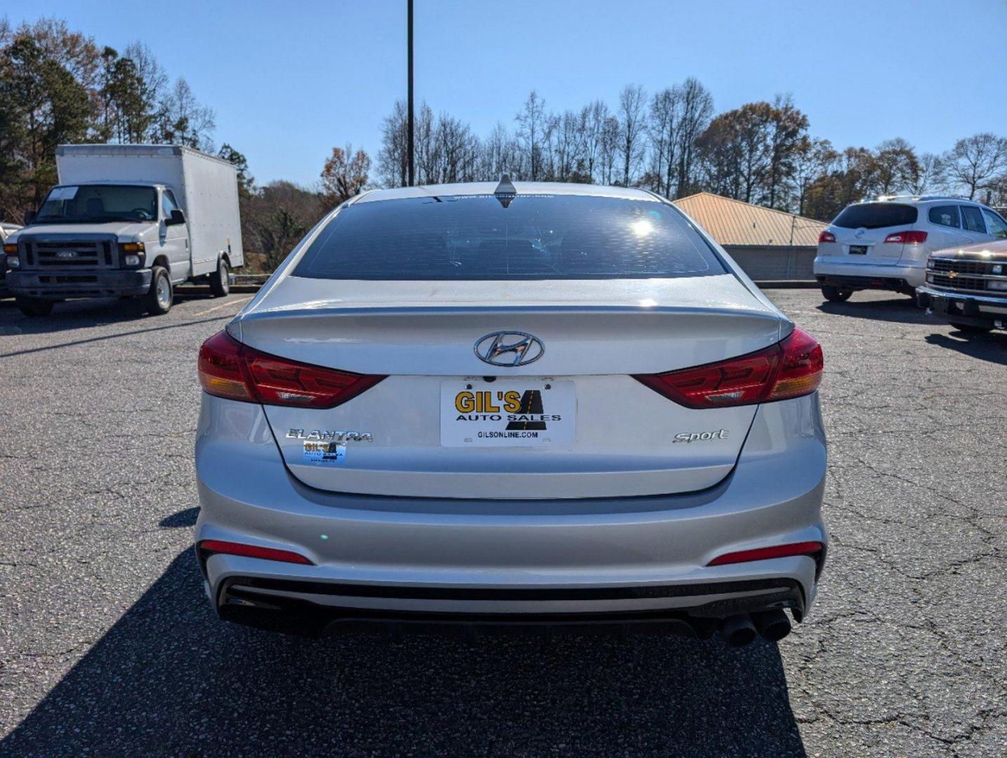 2018 /Black Hyundai Elantra Sport (KMHD04LB6JU) with an Intercooled Turbo Regular Unleaded I-4 1.6 L/97 engine, 7-Speed Auto-Shift Manual w/OD transmission, located at 3959 U.S. 80 W, Phenix City, AL, 36870, (334) 297-4885, 32.469296, -85.135185 - 2018 Hyundai Elantra Sport - Photo#5