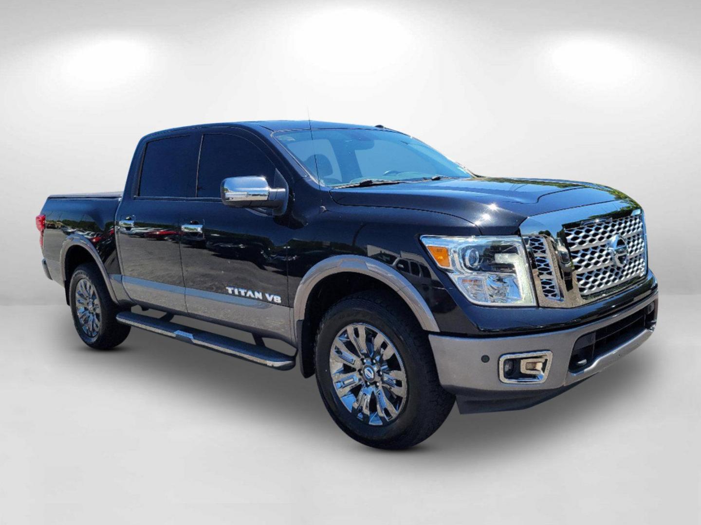 2018 Magnetic Black /Black/Brown Nissan Titan Platinum Reserve (1N6AA1E58JN) with an Regular Unleaded V-8 5.6 L/339 engine, 7-Speed Automatic w/OD transmission, located at 7000 Northlake Connector, Columbus, GA, 31904, (706) 987-8085, 32.524975, -84.978134 - 2018 Nissan Titan Platinum Reserve - Photo#2