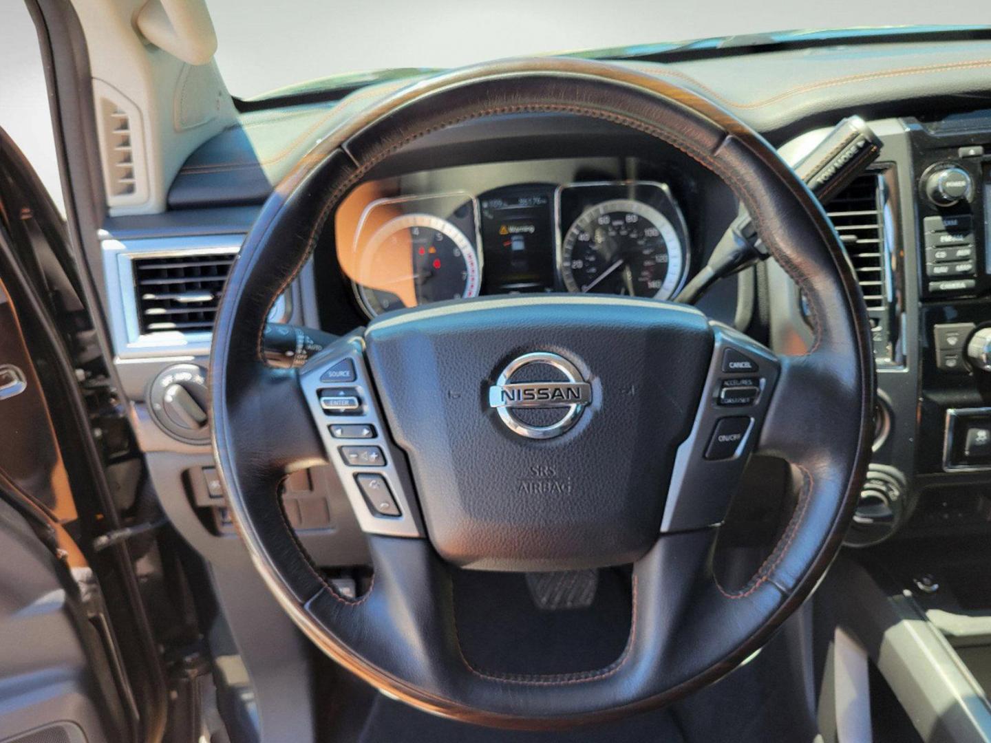 2018 Magnetic Black /Black/Brown Nissan Titan Platinum Reserve (1N6AA1E58JN) with an Regular Unleaded V-8 5.6 L/339 engine, 7-Speed Automatic w/OD transmission, located at 7000 Northlake Connector, Columbus, GA, 31904, (706) 987-8085, 32.524975, -84.978134 - 2018 Nissan Titan Platinum Reserve - Photo#12