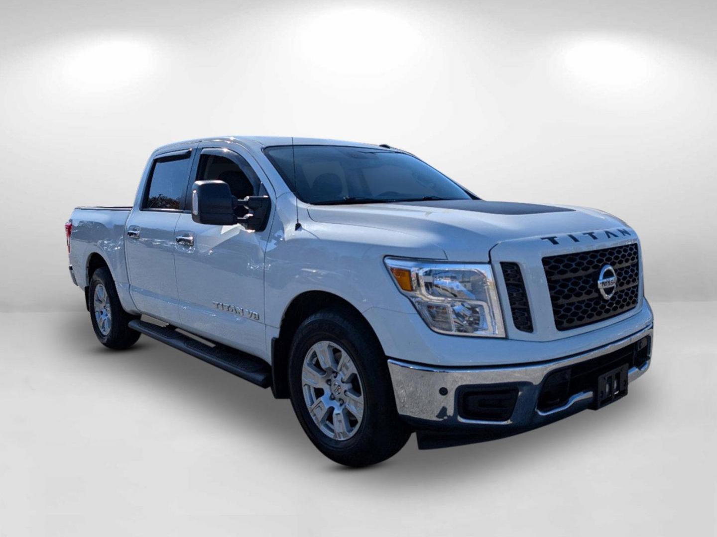 2019 /Black Nissan Titan SV (1N6AA1E61KN) with an Regular Unleaded V-8 5.6 L/339 engine, 7-Speed Automatic w/OD transmission, located at 1430 Gateway Drive, Opelika, AL, 36801, (334) 239-0944, 32.637871, -85.409790 - 2019 Nissan Titan SV - Photo#2