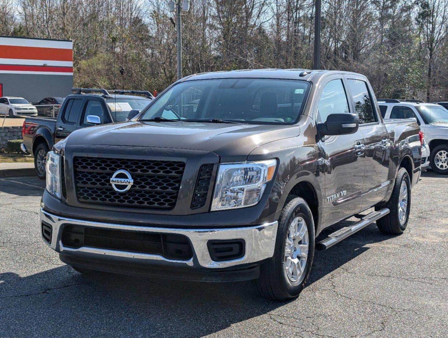 2019 /Black Nissan Titan SV (1N6AA1EK1KN) with an Regular Unleaded V-8 5.6 L/339 engine, 7-Speed Automatic w/OD transmission, located at 804 22nd Ave, Phenix City, AL, 36870, (334) 297-1860, 32.484749, -85.024475 - 2019 Nissan Titan SV - Photo#0