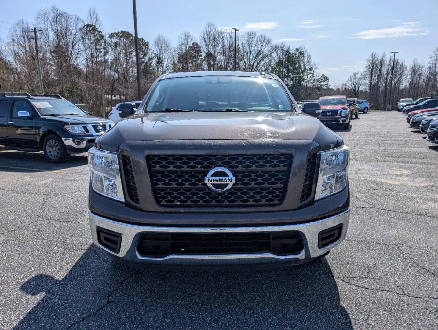 2019 /Black Nissan Titan SV (1N6AA1EK1KN) with an Regular Unleaded V-8 5.6 L/339 engine, 7-Speed Automatic w/OD transmission, located at 804 22nd Ave, Phenix City, AL, 36870, (334) 297-1860, 32.484749, -85.024475 - 2019 Nissan Titan SV - Photo#1