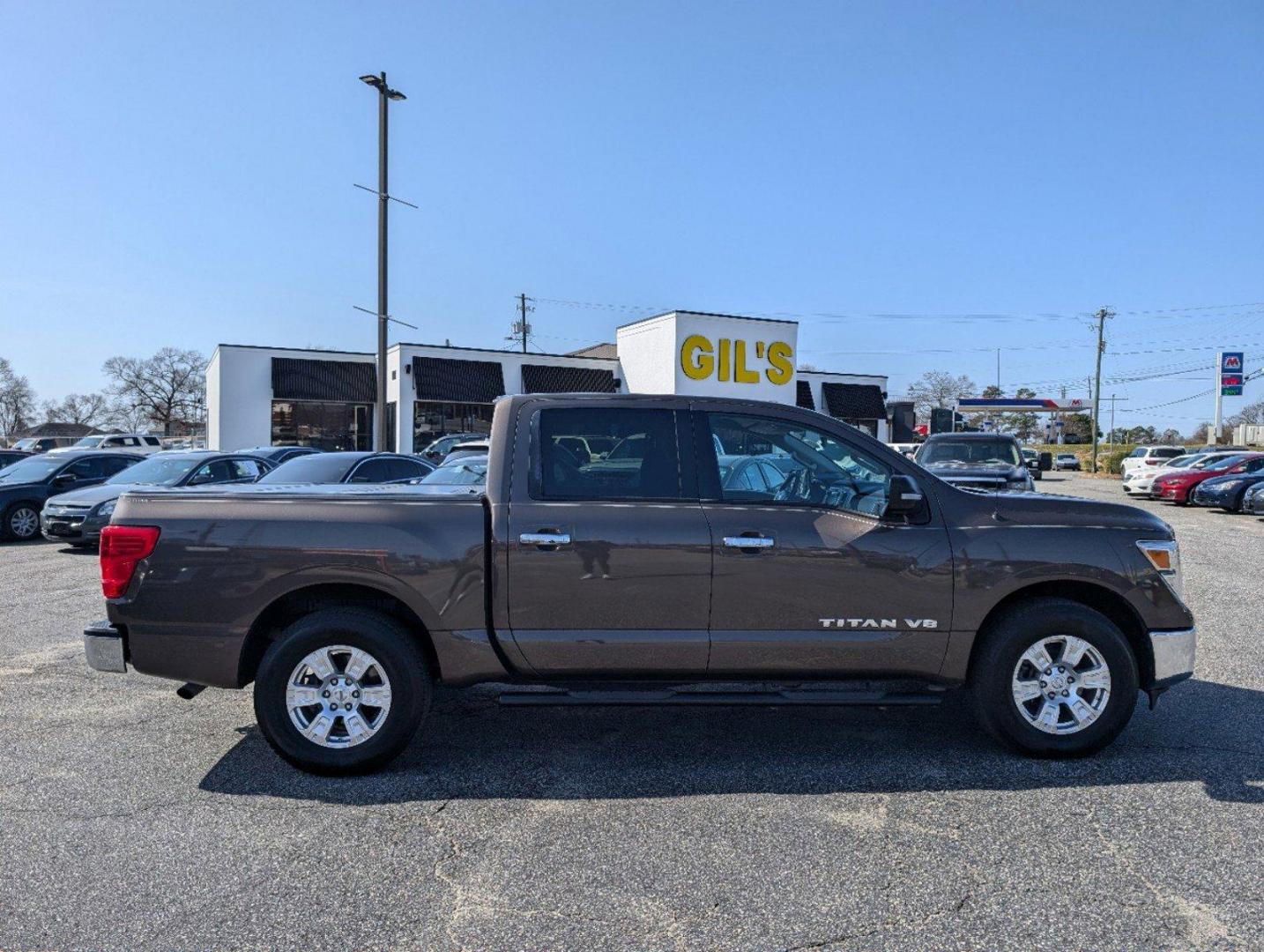 2019 /Black Nissan Titan SV (1N6AA1EK1KN) with an Regular Unleaded V-8 5.6 L/339 engine, 7-Speed Automatic w/OD transmission, located at 804 22nd Ave, Phenix City, AL, 36870, (334) 297-1860, 32.484749, -85.024475 - 2019 Nissan Titan SV - Photo#3