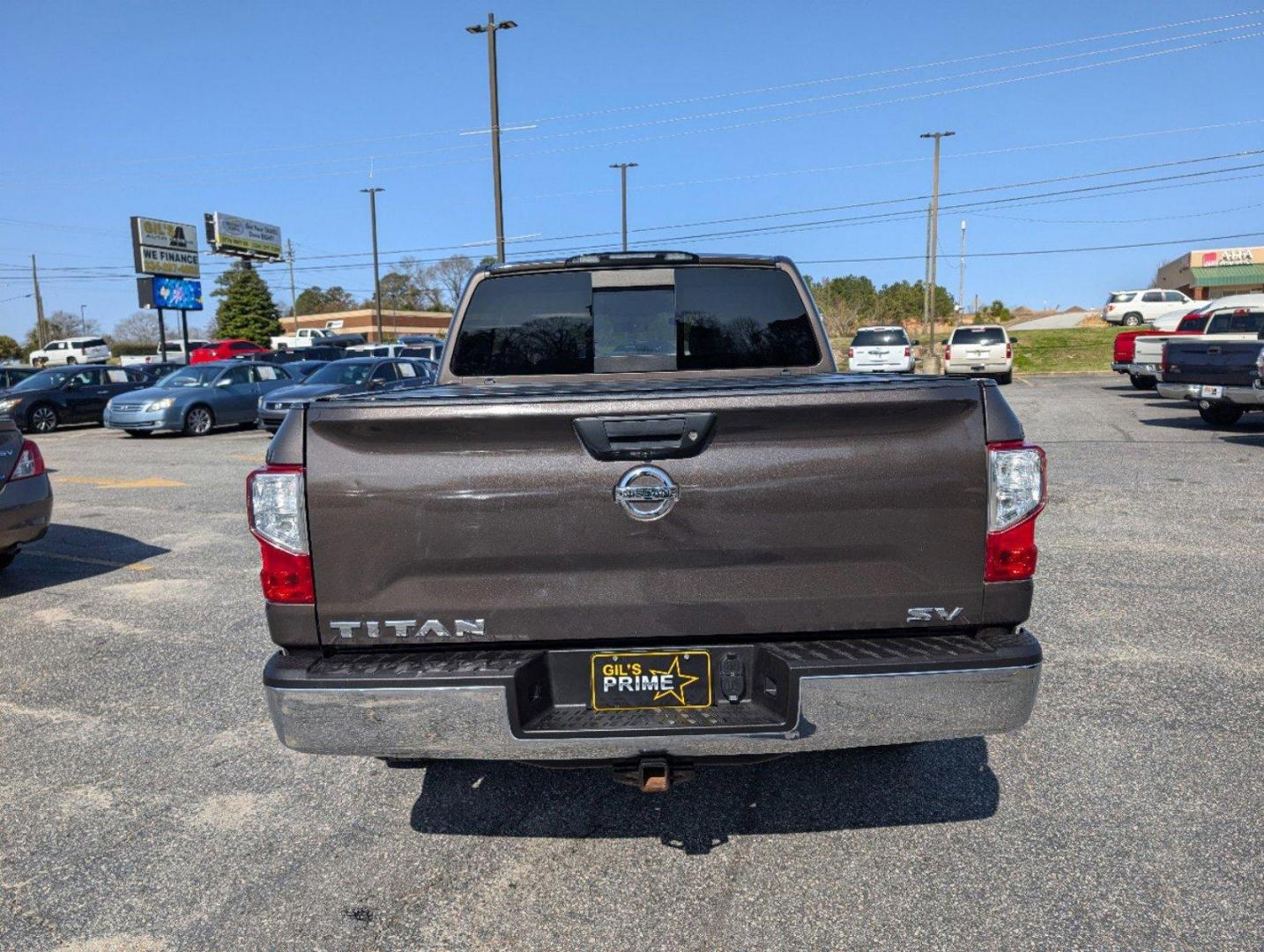 2019 /Black Nissan Titan SV (1N6AA1EK1KN) with an Regular Unleaded V-8 5.6 L/339 engine, 7-Speed Automatic w/OD transmission, located at 804 22nd Ave, Phenix City, AL, 36870, (334) 297-1860, 32.484749, -85.024475 - 2019 Nissan Titan SV - Photo#5