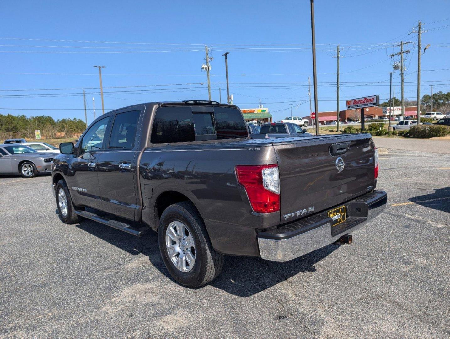 2019 /Black Nissan Titan SV (1N6AA1EK1KN) with an Regular Unleaded V-8 5.6 L/339 engine, 7-Speed Automatic w/OD transmission, located at 804 22nd Ave, Phenix City, AL, 36870, (334) 297-1860, 32.484749, -85.024475 - 2019 Nissan Titan SV - Photo#6