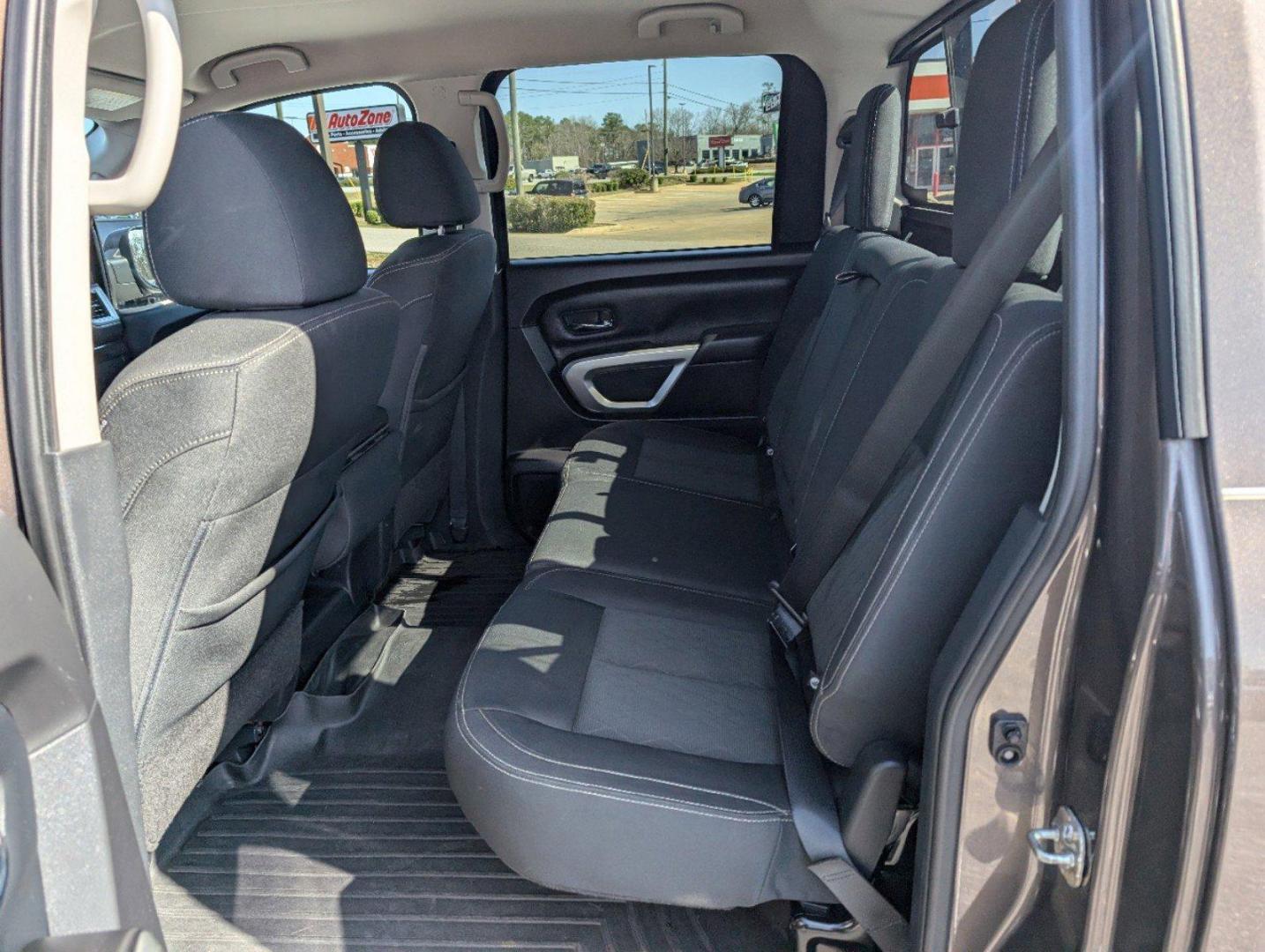 2019 /Black Nissan Titan SV (1N6AA1EK1KN) with an Regular Unleaded V-8 5.6 L/339 engine, 7-Speed Automatic w/OD transmission, located at 804 22nd Ave, Phenix City, AL, 36870, (334) 297-1860, 32.484749, -85.024475 - 2019 Nissan Titan SV - Photo#11