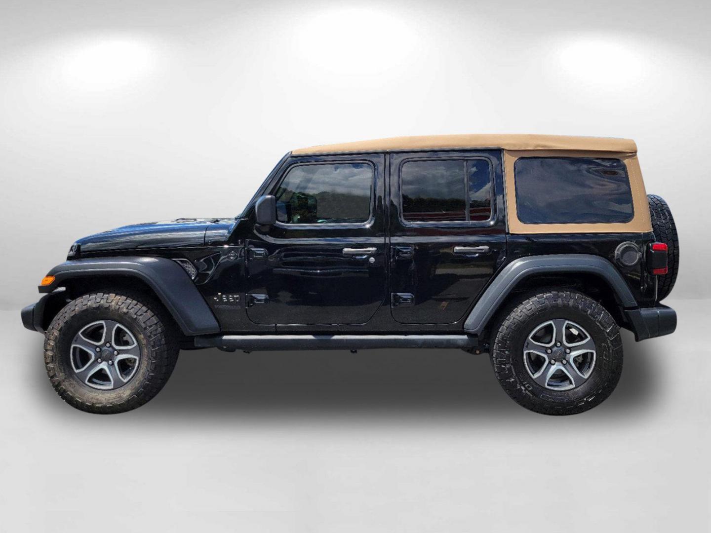 2020 Black Clearcoat /Heritage Tan/Black Jeep Wrangler Unlimited Black and Tan (1C4HJXDG9LW) with an Regular Unleaded V-6 3.6 L/220 engine, 8-Speed Automatic w/OD transmission, located at 1430 Gateway Drive, Opelika, AL, 36801, (334) 239-0944, 32.637871, -85.409790 - 2020 Jeep Wrangler Unlimited Black and Tan - Photo#7