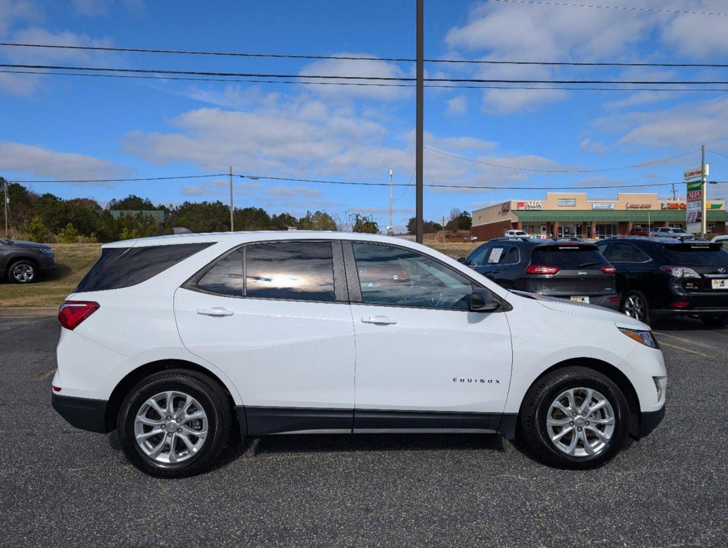 2021 /Medium Ash Gray Chevrolet Equinox LS (2GNAXHEV8M6) with an Turbocharged Gas I4 1.5L/92 engine, 6-Speed Automatic transmission, located at 804 22nd Ave, Phenix City, AL, 36870, (334) 297-1860, 32.484749, -85.024475 - 2021 Chevrolet Equinox LS - Photo#3