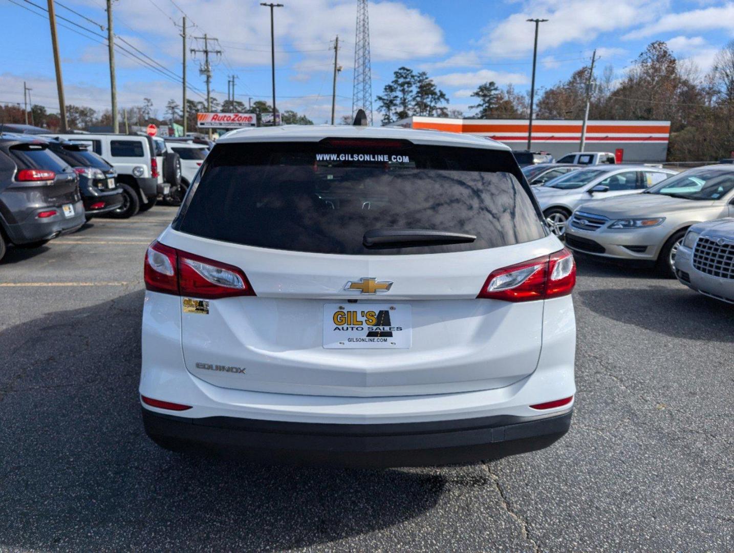 2021 /Medium Ash Gray Chevrolet Equinox LS (2GNAXHEV8M6) with an Turbocharged Gas I4 1.5L/92 engine, 6-Speed Automatic transmission, located at 804 22nd Ave, Phenix City, AL, 36870, (334) 297-1860, 32.484749, -85.024475 - 2021 Chevrolet Equinox LS - Photo#5