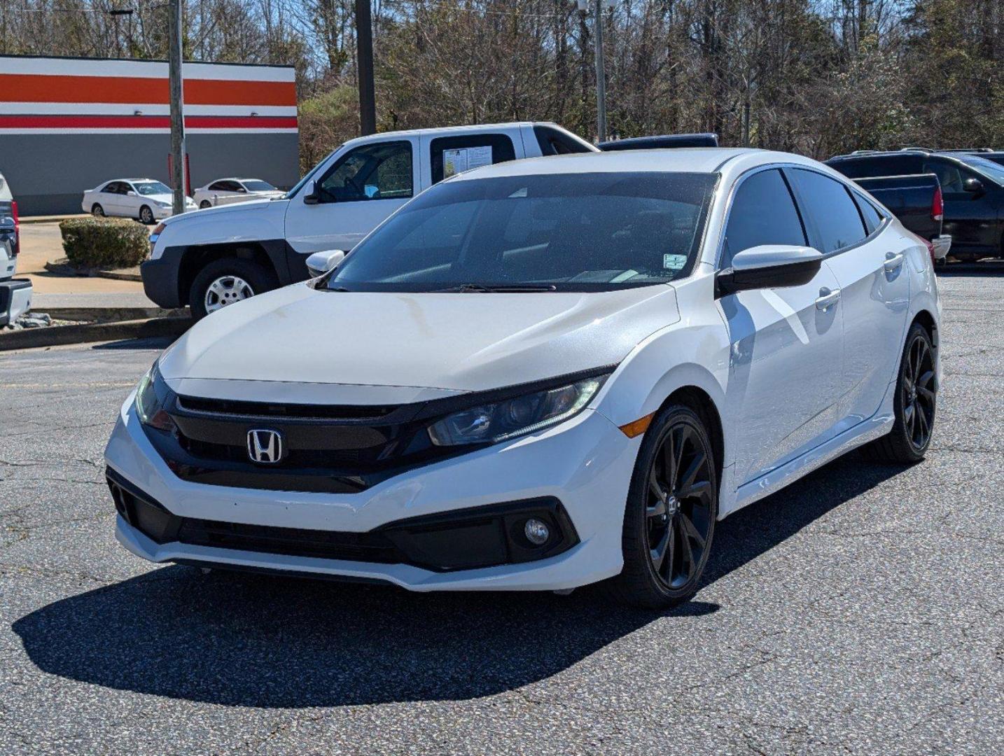 2021 Honda Civic Sedan Sport (19XFC2F89ME) with an Regular Unleaded I-4 2.0 L/122 engine, 1-Speed CVT w/OD transmission, located at 3959 U.S. 80 W, Phenix City, AL, 36870, (334) 297-4885, 32.469296, -85.135185 - 2021 Honda Civic Sedan Sport - Photo#0