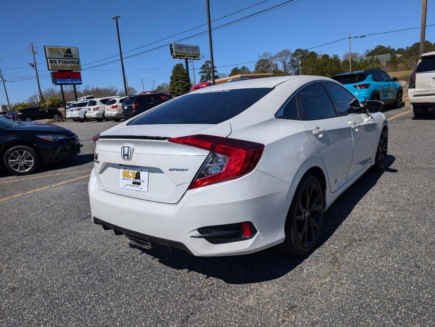 2021 Honda Civic Sedan Sport (19XFC2F89ME) with an Regular Unleaded I-4 2.0 L/122 engine, 1-Speed CVT w/OD transmission, located at 3959 U.S. 80 W, Phenix City, AL, 36870, (334) 297-4885, 32.469296, -85.135185 - 2021 Honda Civic Sedan Sport - Photo#4