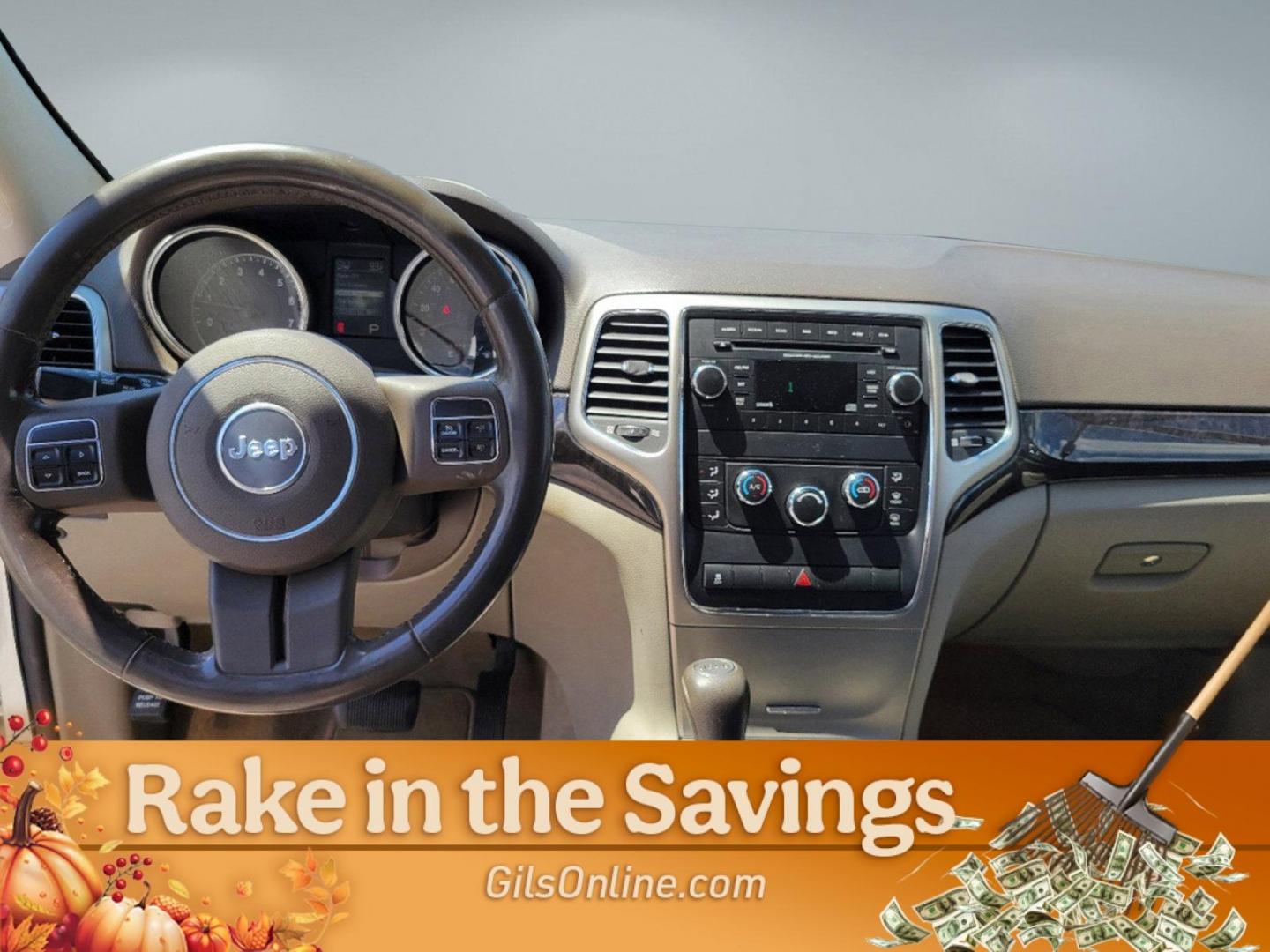 2012 Stone White /Dark Graystone/Medium Graystone Jeep Grand Cherokee Laredo (1C4RJFAG1CC) with an Gas/Ethanol V6 3.6L/220 engine, 5-Speed Automatic transmission, located at 7000 Northlake Connector, Columbus, GA, 31904, (706) 987-8085, 32.524975, -84.978134 - 2012 Jeep Grand Cherokee Laredo - Photo#11