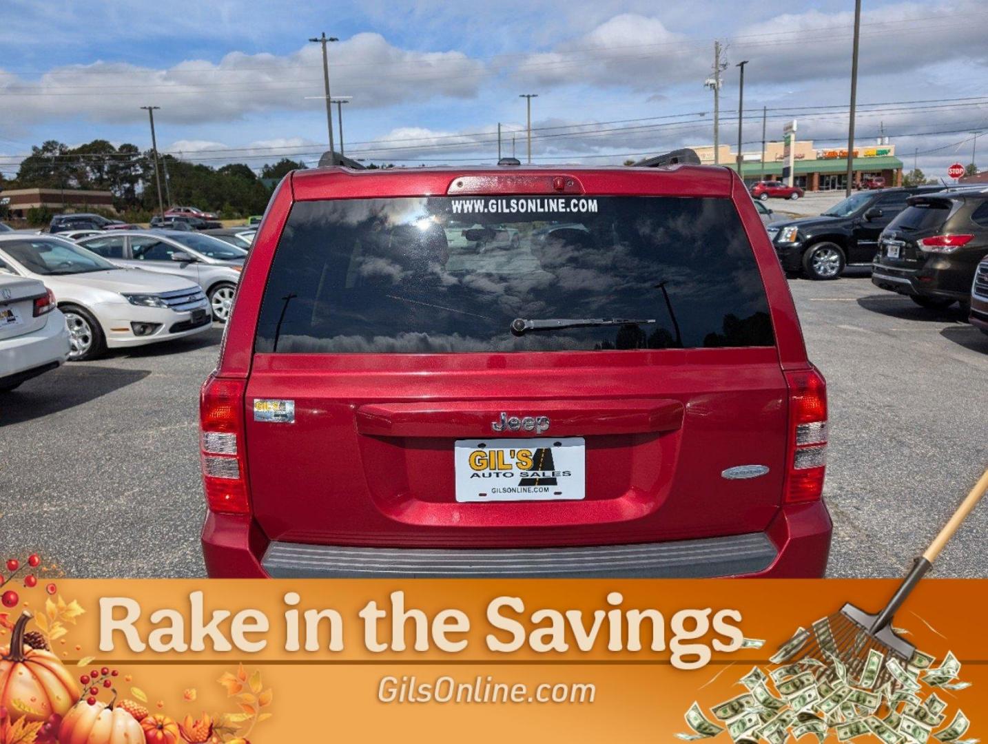 2013 /Dark Slate Gray Interior Jeep Patriot Latitude (1C4NJPFB8DD) with an Gas I4 2.4L/144 engine, 1-Speed Continuously Variable Ratio transmission, located at 3959 U.S. 80 W, Phenix City, AL, 36870, (334) 297-4885, 32.469296, -85.135185 - 2013 Jeep Patriot Latitude - Photo#12