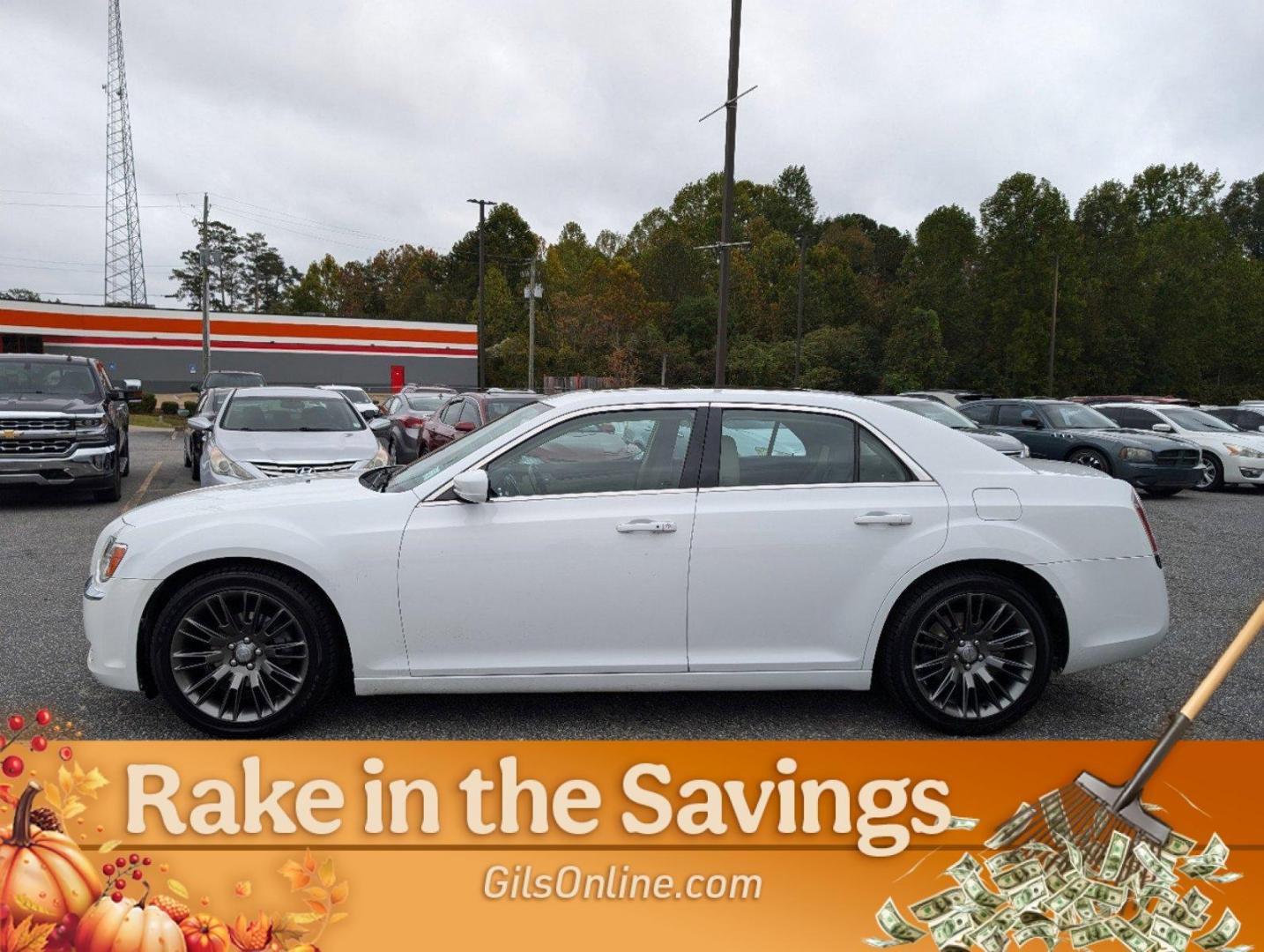 2014 /Lt Frost Beige/Black Chrysler 300 (2C3CCAAG4EH) with an Regular Unleaded V-6 3.6 L/220 engine, 8-Speed Automatic w/OD transmission, located at 3959 U.S. 80 W, Phenix City, AL, 36870, (334) 297-4885, 32.469296, -85.135185 - 2014 Chrysler 300 - Photo#7