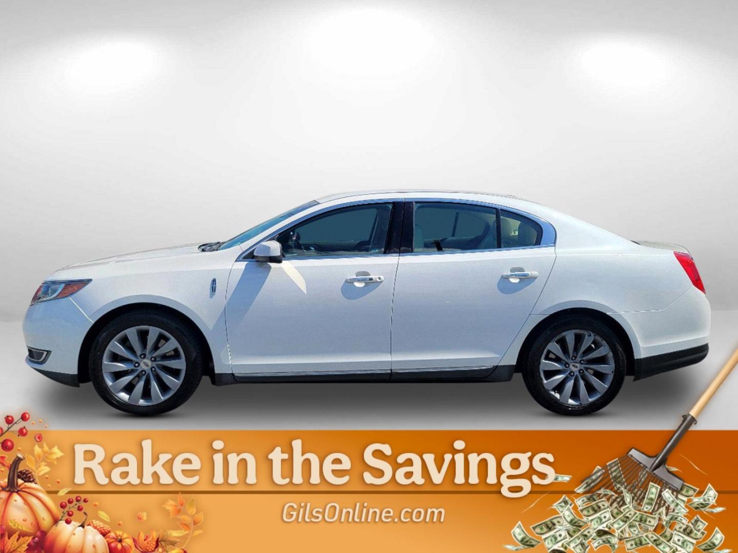 2013 White Lincoln MKS (1LNHL9DKXDG) with an Gas V6 3.7L/ engine, 6-Speed Automatic transmission, located at 7000 Northlake Connector, Columbus, GA, 31904, (706) 987-8085, 32.524975, -84.978134 - 2013 Lincoln MKS - Photo#7