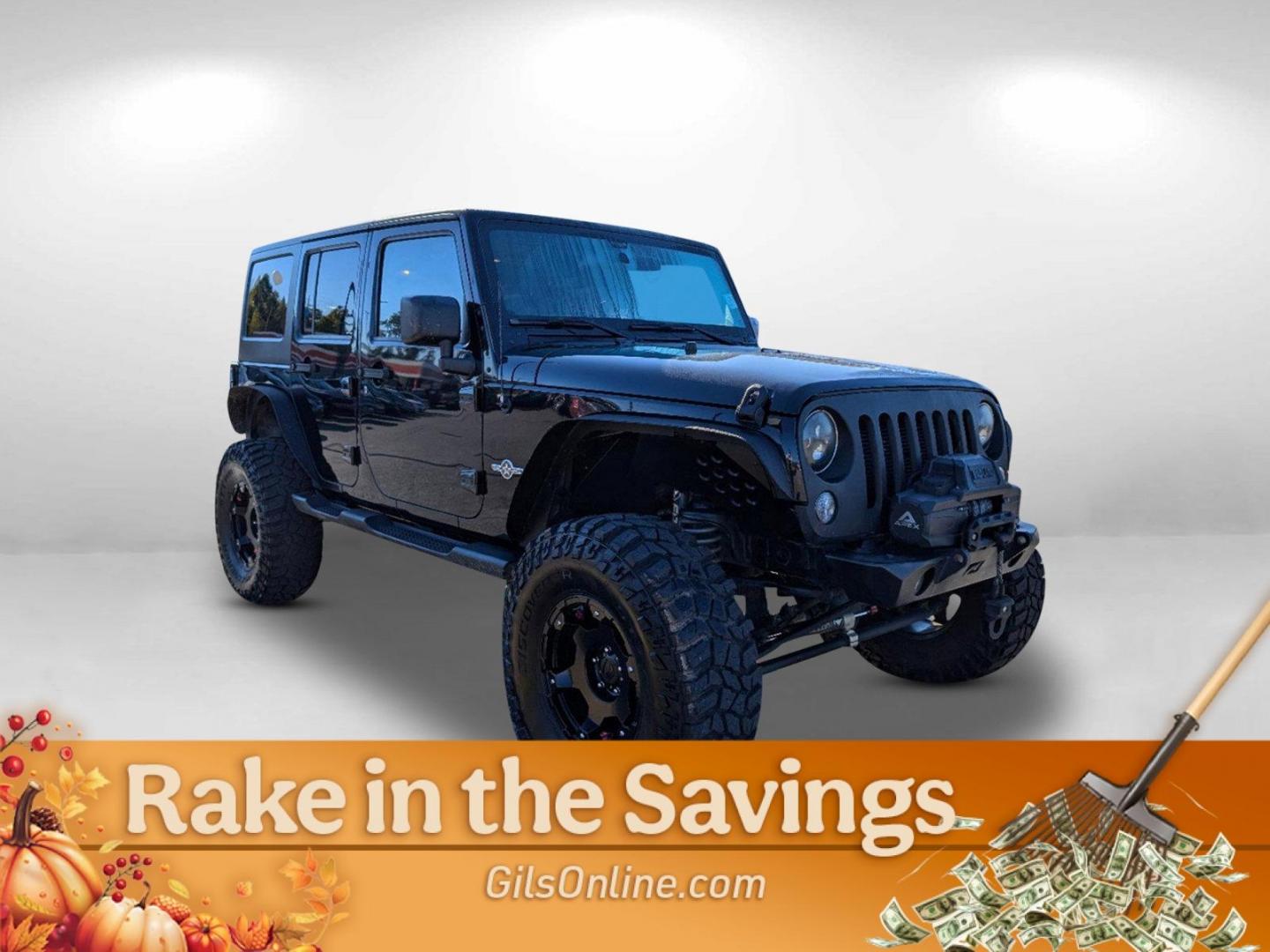 2014 /Black Jeep Wrangler Unlimited Freedom Edition (1C4BJWDG4EL) with an Regular Unleaded V-6 3.6 L/220 engine, 5-Speed Automatic w/OD transmission, located at 3959 U.S. 80 W, Phenix City, AL, 36870, (334) 297-4885, 32.469296, -85.135185 - 2014 Jeep Wrangler Unlimited Freedom Edition - Photo#2