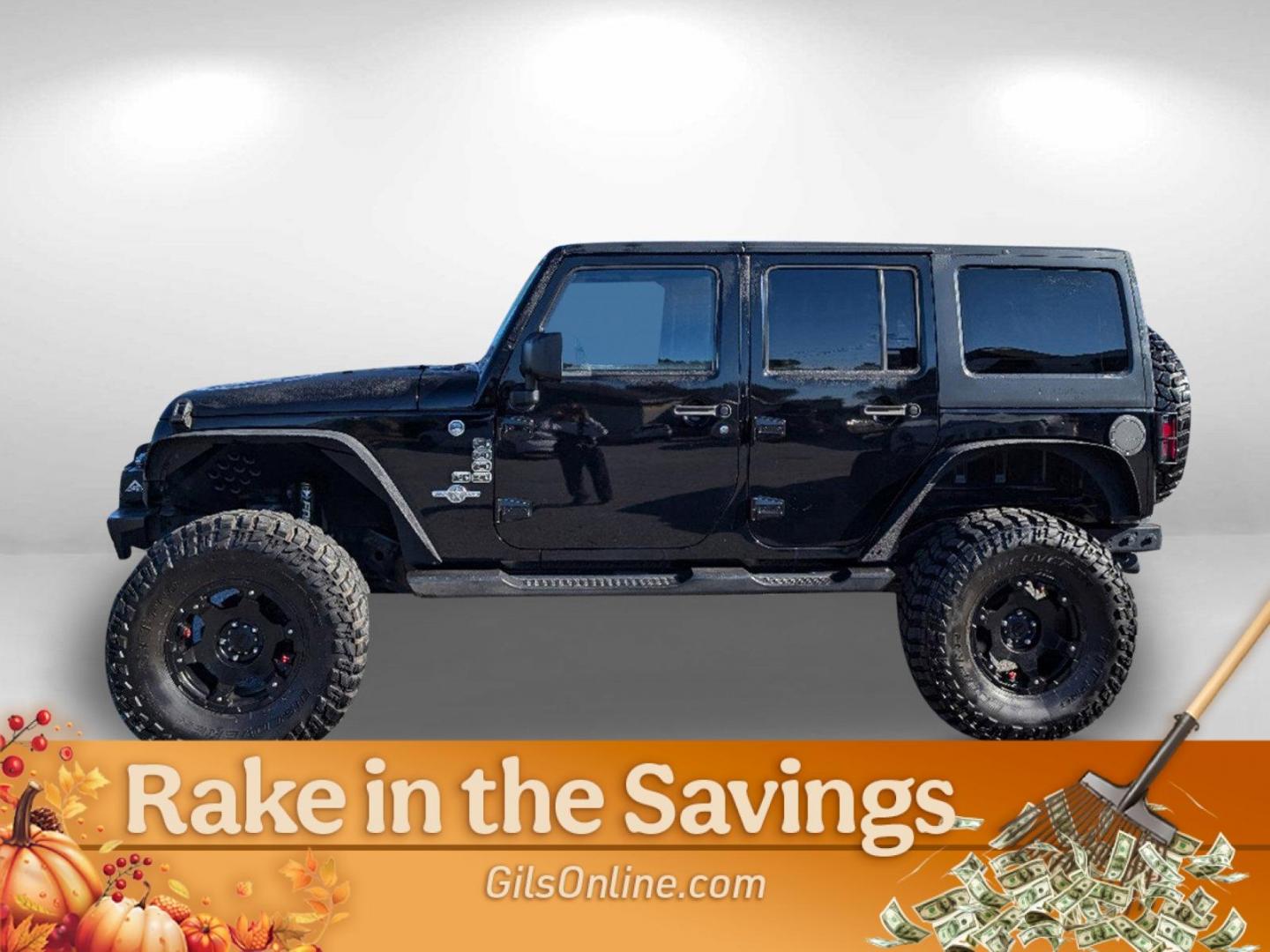 2014 /Black Jeep Wrangler Unlimited Freedom Edition (1C4BJWDG4EL) with an Regular Unleaded V-6 3.6 L/220 engine, 5-Speed Automatic w/OD transmission, located at 3959 U.S. 80 W, Phenix City, AL, 36870, (334) 297-4885, 32.469296, -85.135185 - 2014 Jeep Wrangler Unlimited Freedom Edition - Photo#7