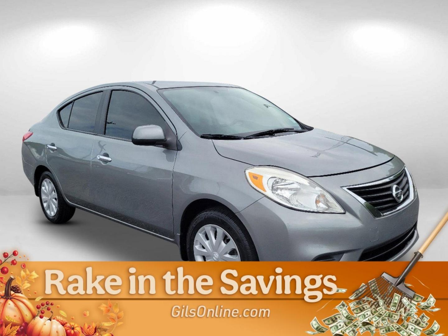 2012 Magnetic Gray Metallic /Charcoal Nissan Versa SV (3N1CN7AP2CL) with an Gas I4 1.6L/97 engine, 1-Speed Continuously Variable transmission, located at 7000 Northlake Connector, Columbus, GA, 31904, (706) 987-8085, 32.524975, -84.978134 - 2012 Nissan Versa SV - Photo#2