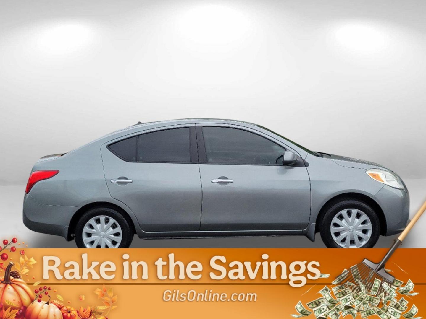 2012 Magnetic Gray Metallic /Charcoal Nissan Versa SV (3N1CN7AP2CL) with an Gas I4 1.6L/97 engine, 1-Speed Continuously Variable transmission, located at 7000 Northlake Connector, Columbus, GA, 31904, (706) 987-8085, 32.524975, -84.978134 - 2012 Nissan Versa SV - Photo#3