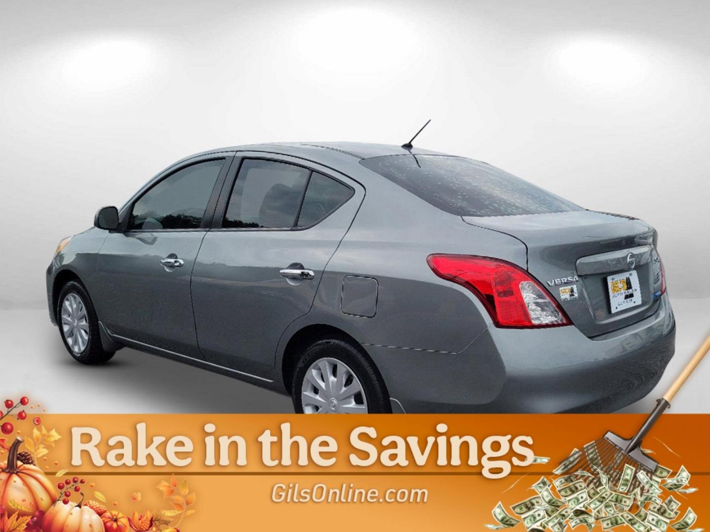 2012 Magnetic Gray Metallic /Charcoal Nissan Versa SV (3N1CN7AP2CL) with an Gas I4 1.6L/97 engine, 1-Speed Continuously Variable transmission, located at 7000 Northlake Connector, Columbus, GA, 31904, (706) 987-8085, 32.524975, -84.978134 - 2012 Nissan Versa SV - Photo#6