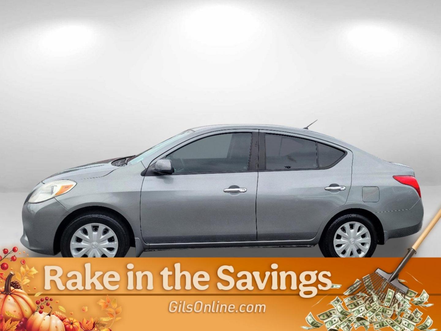 2012 Magnetic Gray Metallic /Charcoal Nissan Versa SV (3N1CN7AP2CL) with an Gas I4 1.6L/97 engine, 1-Speed Continuously Variable transmission, located at 7000 Northlake Connector, Columbus, GA, 31904, (706) 987-8085, 32.524975, -84.978134 - 2012 Nissan Versa SV - Photo#7