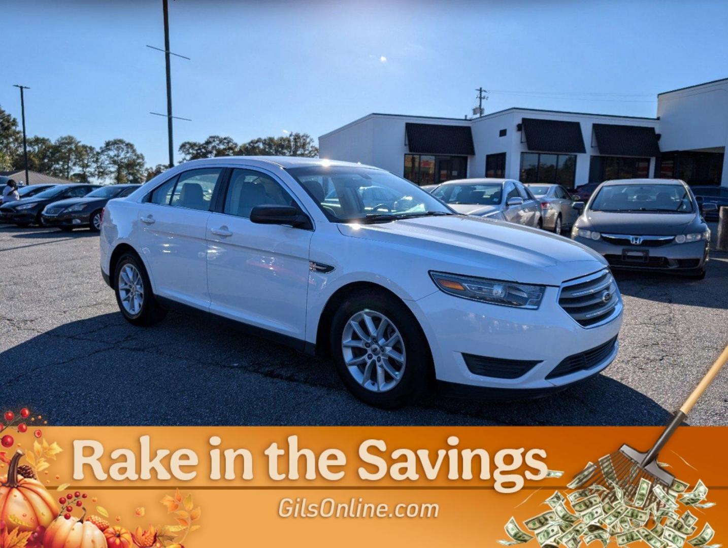 2014 Ford Taurus SE (1FAHP2D99EG) with an Intercooled Turbo Premium Unleaded I-4 2.0 L/122 engine, 6-Speed Automatic w/OD transmission, located at 3959 U.S. 80 W, Phenix City, AL, 36870, (334) 297-4885, 32.469296, -85.135185 - 2014 Ford Taurus SE - Photo#3