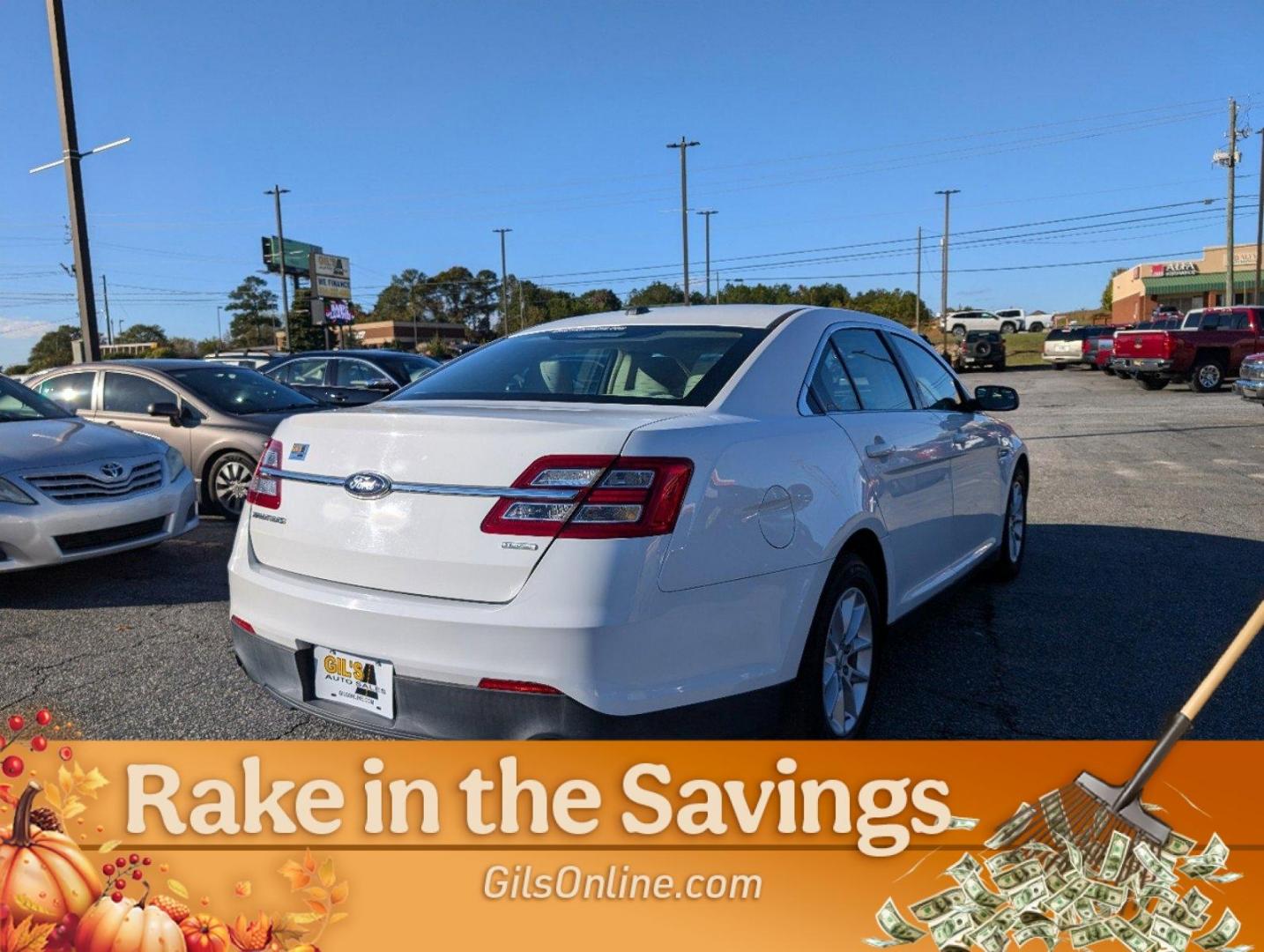 2014 Ford Taurus SE (1FAHP2D99EG) with an Intercooled Turbo Premium Unleaded I-4 2.0 L/122 engine, 6-Speed Automatic w/OD transmission, located at 3959 U.S. 80 W, Phenix City, AL, 36870, (334) 297-4885, 32.469296, -85.135185 - 2014 Ford Taurus SE - Photo#4