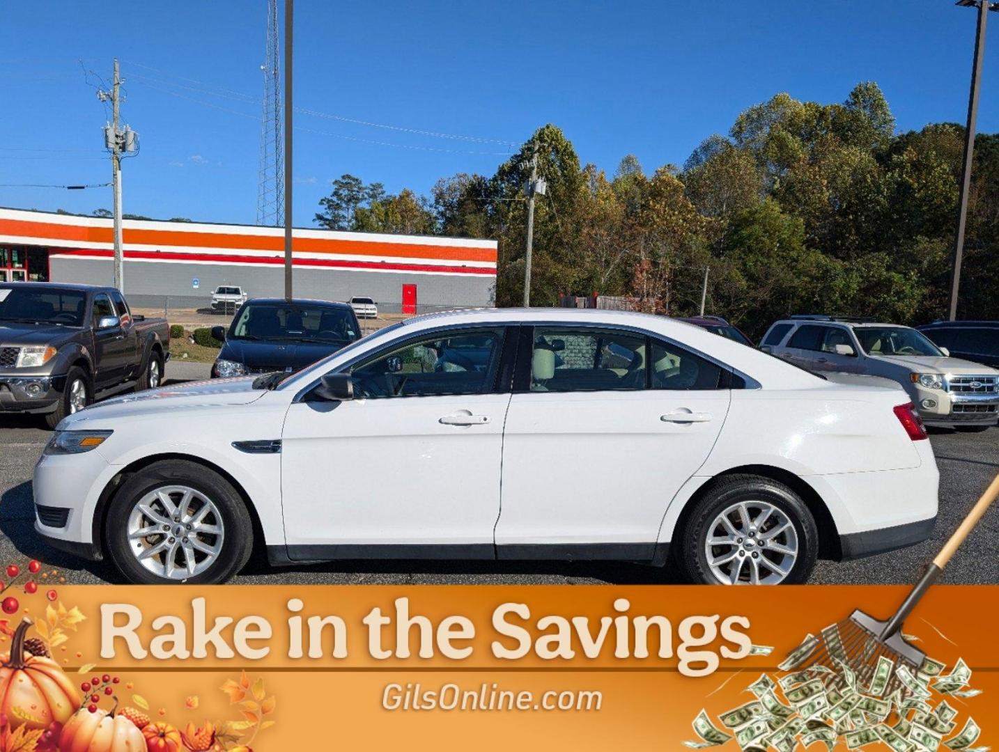 2014 Ford Taurus SE (1FAHP2D99EG) with an Intercooled Turbo Premium Unleaded I-4 2.0 L/122 engine, 6-Speed Automatic w/OD transmission, located at 3959 U.S. 80 W, Phenix City, AL, 36870, (334) 297-4885, 32.469296, -85.135185 - 2014 Ford Taurus SE - Photo#7